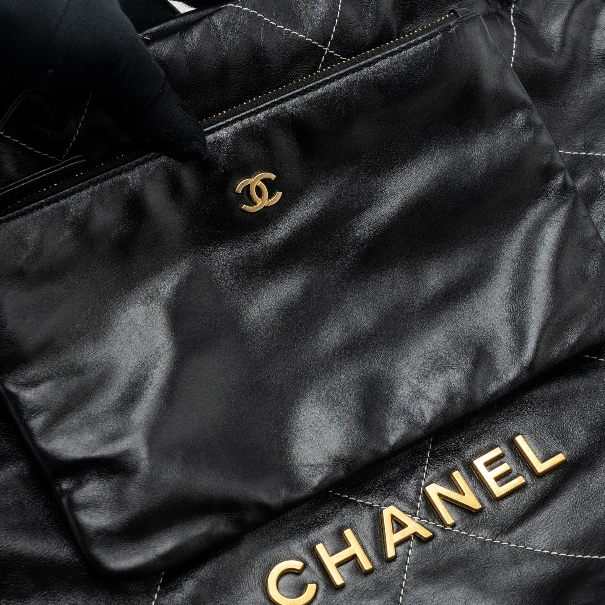 chanel-small-22-bag-gold-letter-shiny-calfskin-black-brushed-ghwmicrochip-1