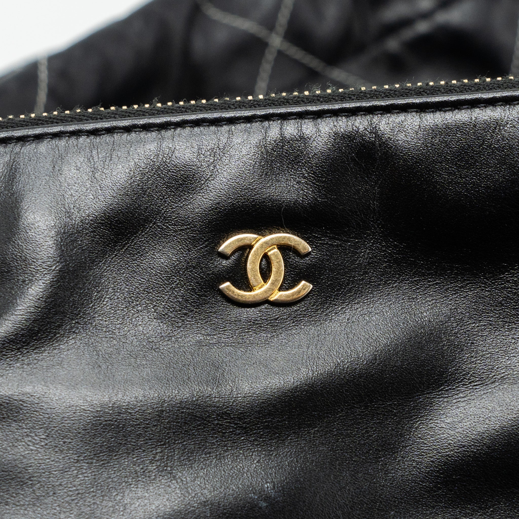 chanel-small-22-bag-gold-letter-shiny-calfskin-black-brushed-ghwmicrochip-1