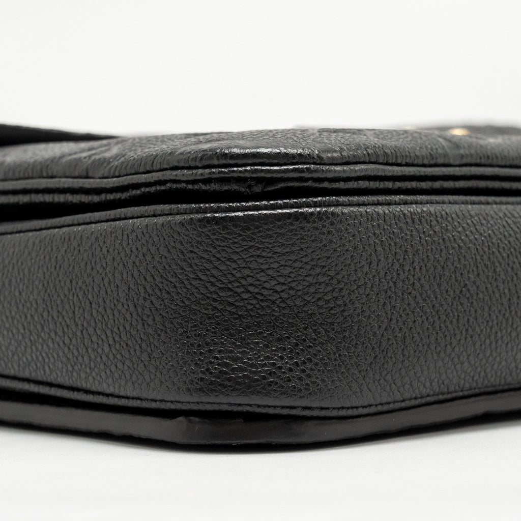 louis-vuitton-pochette-metis-monogram-empreinte-black-ghw-6