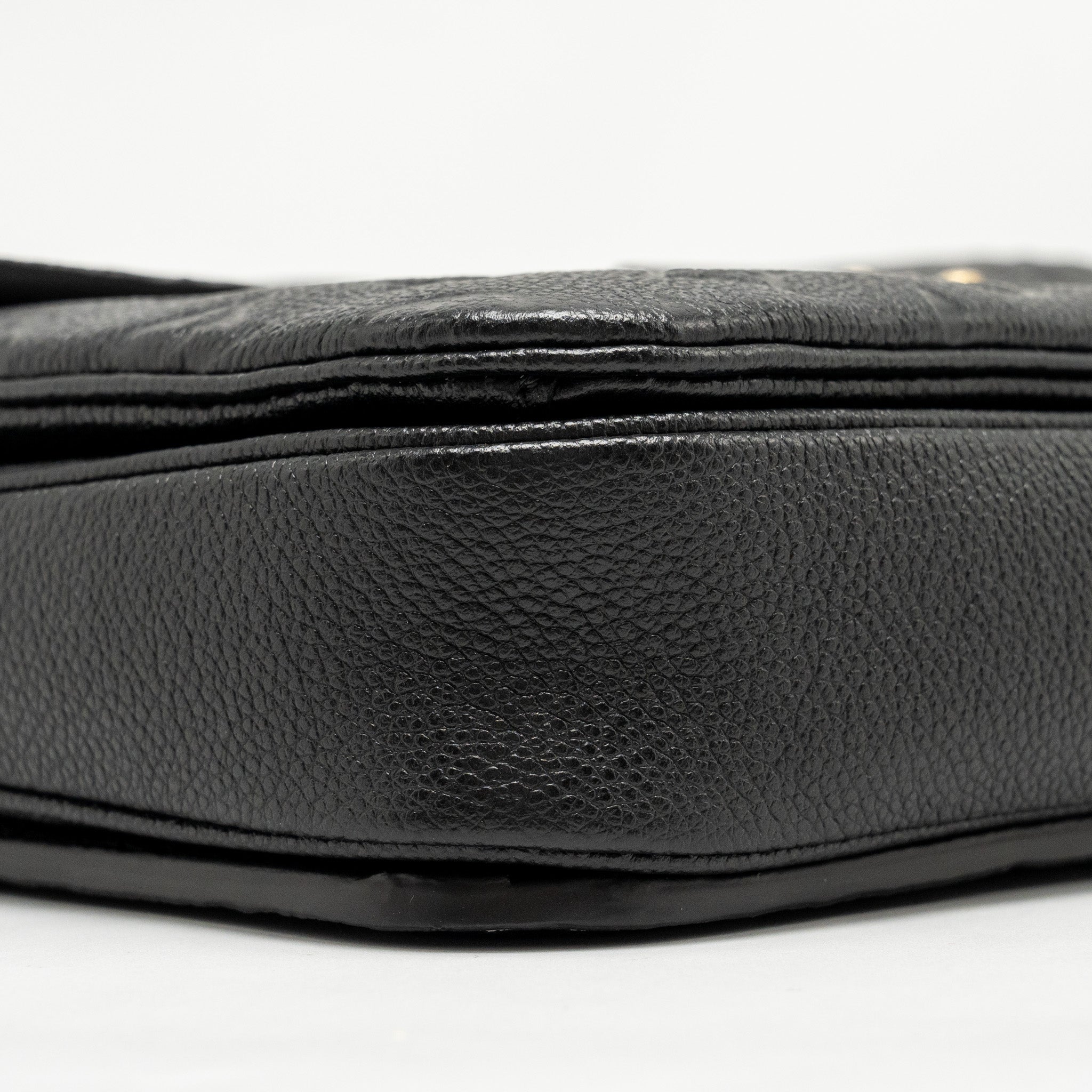 louis-vuitton-pochette-metis-monogram-empreinte-black-ghw-6