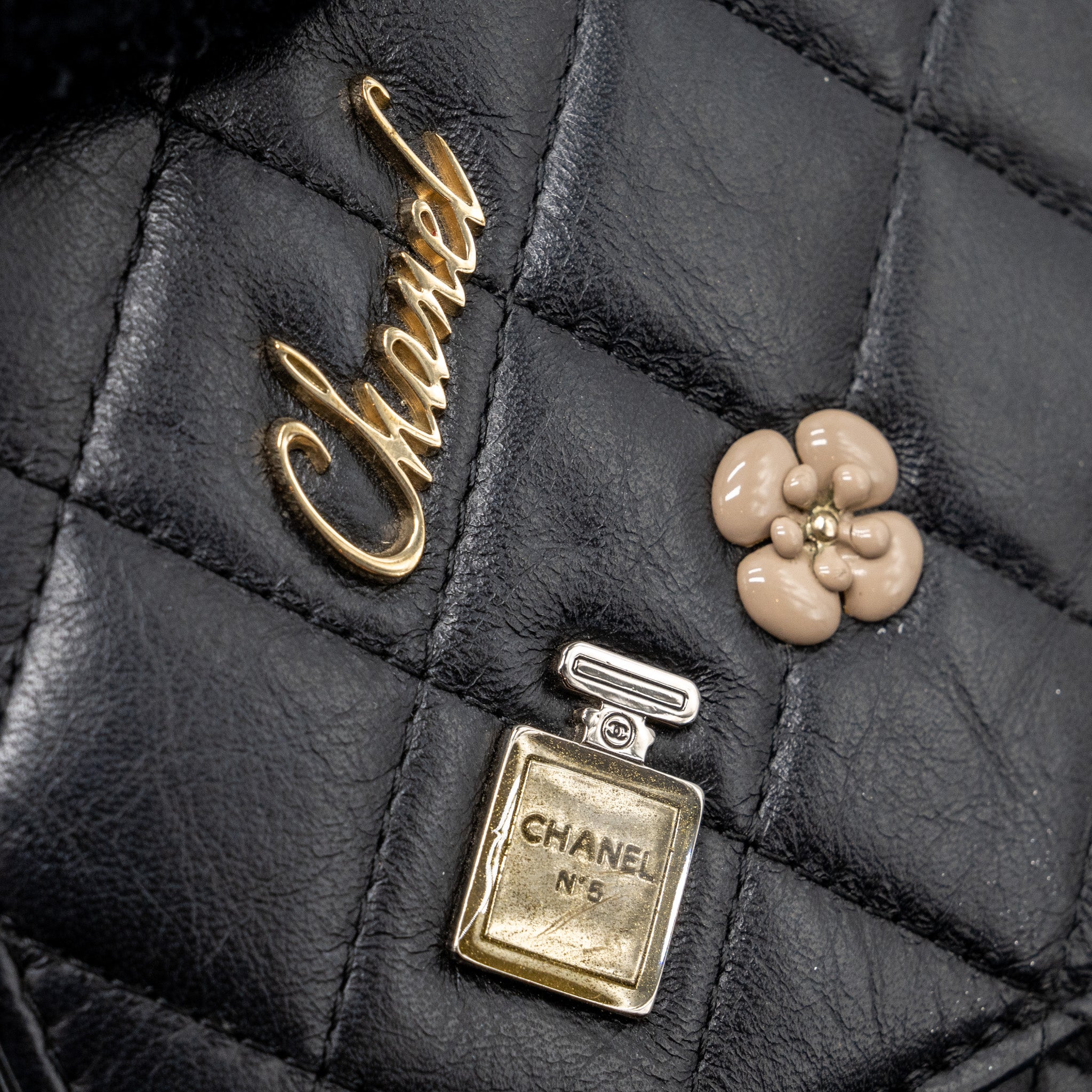 chanel-2-55-reissue-lucky-charms-wallet-on-chain-aged-calfskin-black-ruthenium-shw