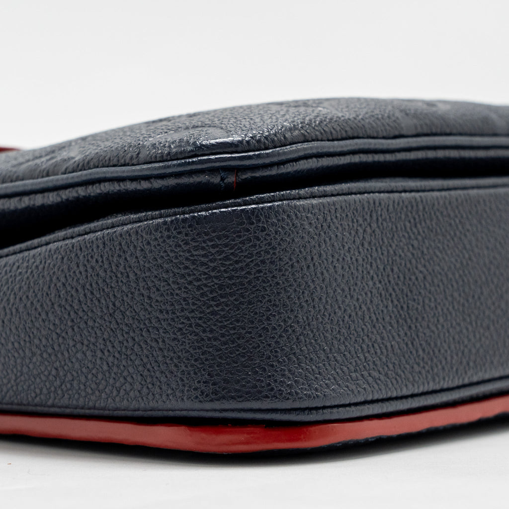 louis-vuitton-pochette-metis-monogram-empreinte-marine-rouge-ghw-copy