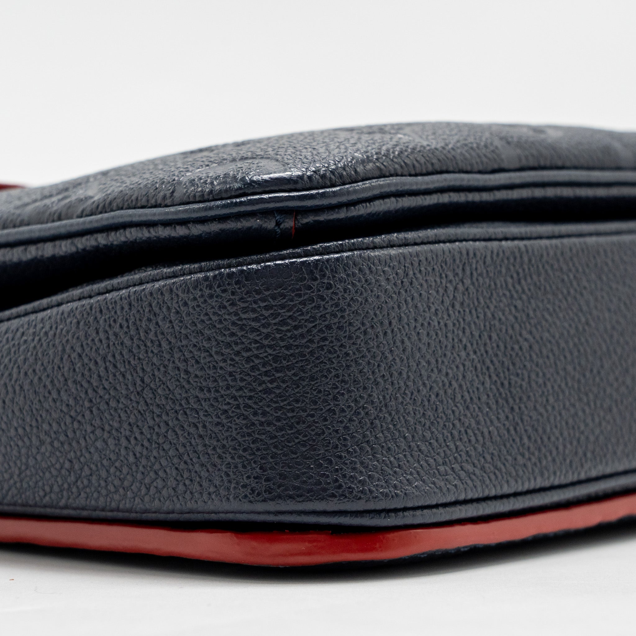 louis-vuitton-pochette-metis-monogram-empreinte-marine-rouge-ghw-copy