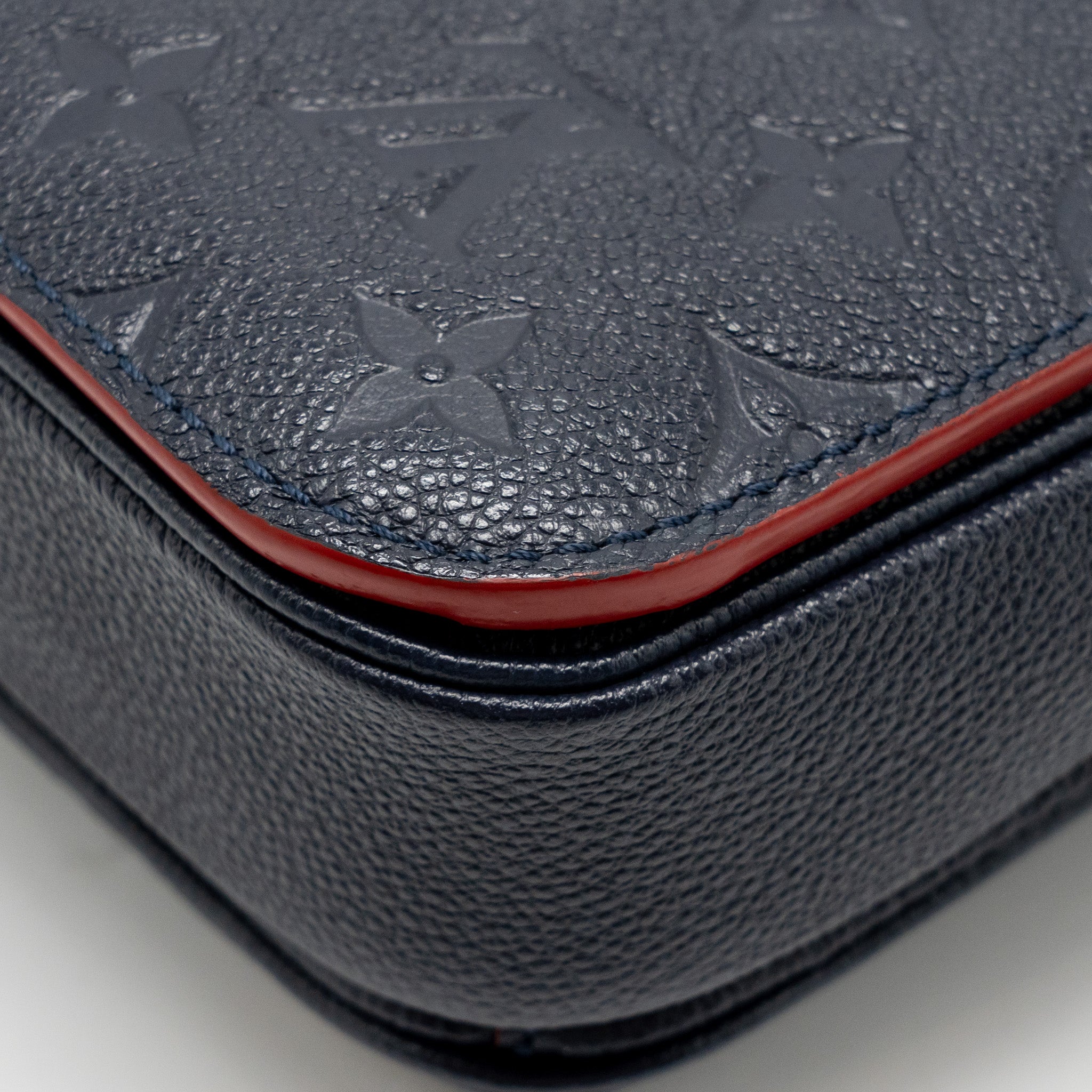 louis-vuitton-pochette-metis-monogram-empreinte-marine-rouge-ghw-copy