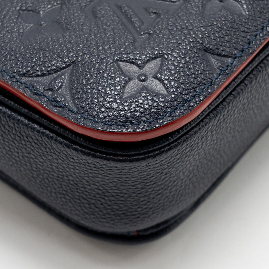 louis-vuitton-pochette-metis-monogram-empreinte-marine-rouge-ghw-copy