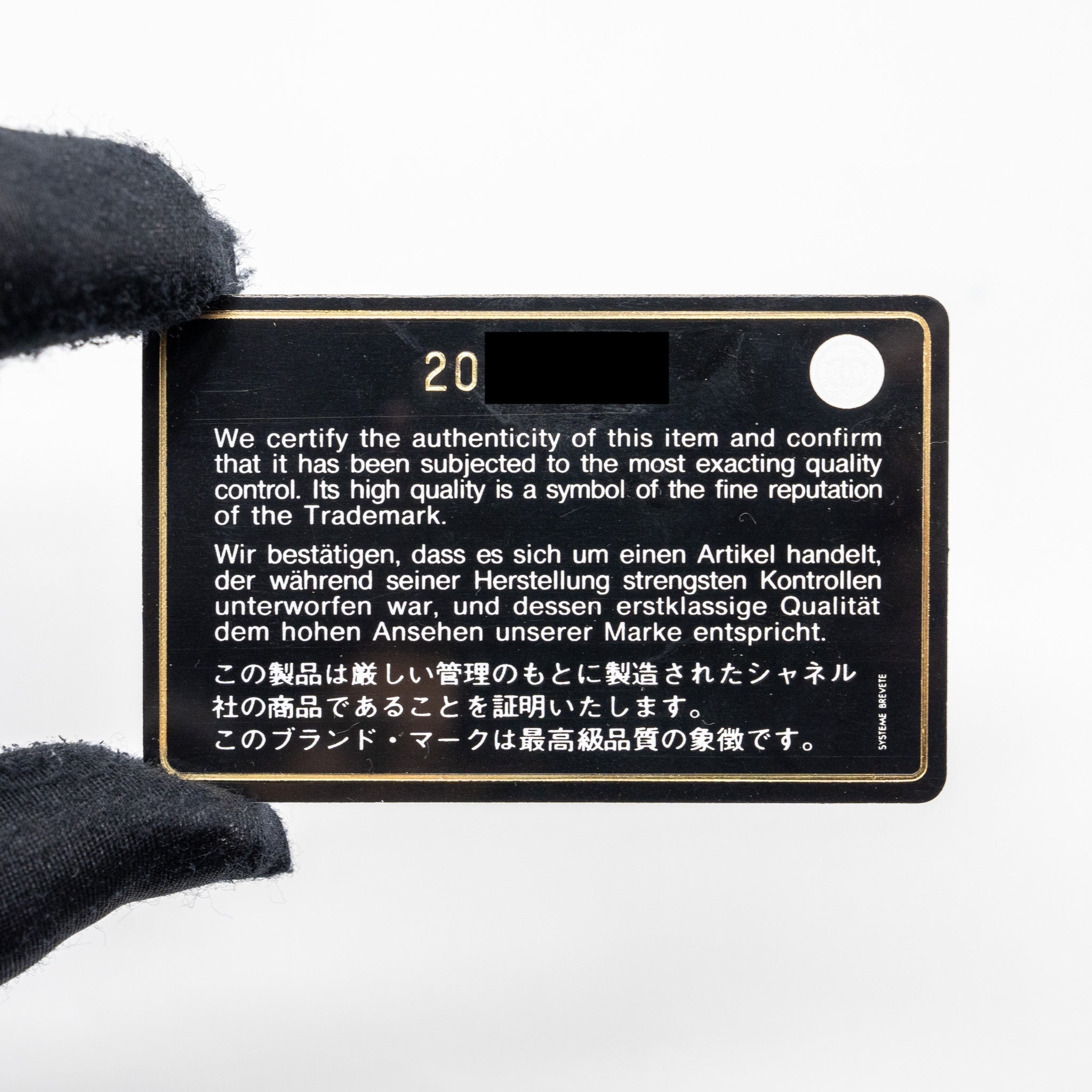 chanel-2-55-reissue-lucky-charms-wallet-on-chain-aged-calfskin-black-ruthenium-shw