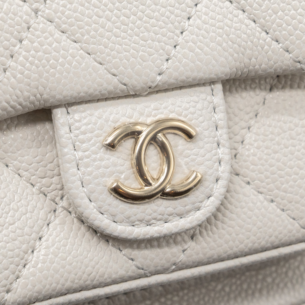 copy-of-chanel-23k-triple-pocket-mini-backpack-caviar-white-lghwmicrochip