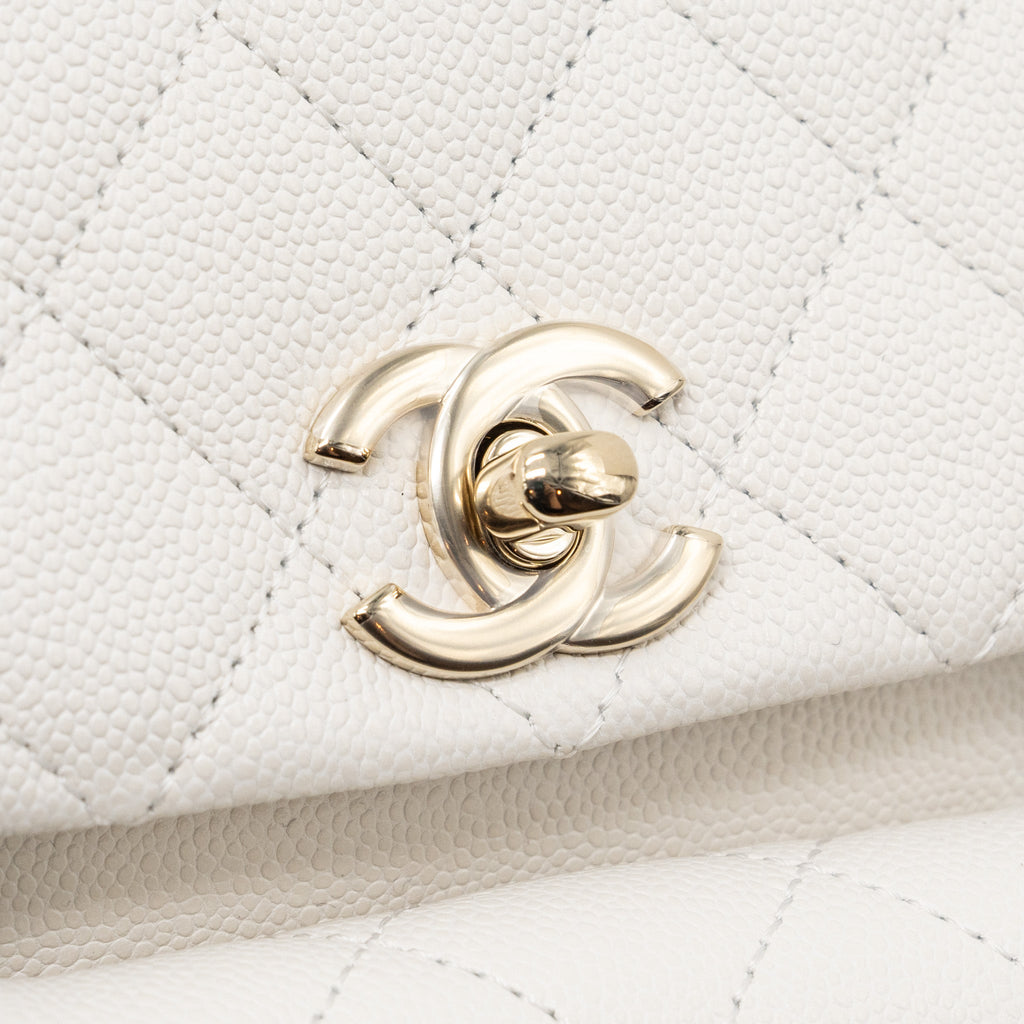 copy-of-chanel-23k-triple-pocket-mini-backpack-caviar-white-lghwmicrochip