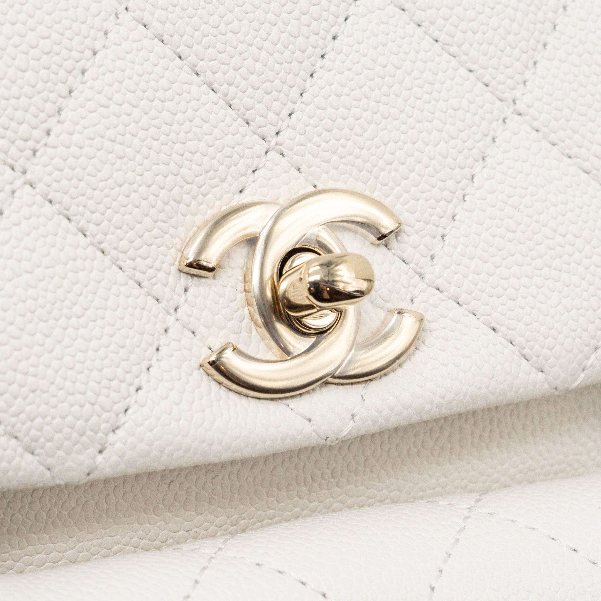 copy-of-chanel-23k-triple-pocket-mini-backpack-caviar-white-lghwmicrochip