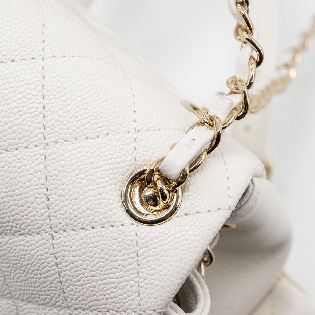 copy-of-chanel-23k-triple-pocket-mini-backpack-caviar-white-lghwmicrochip
