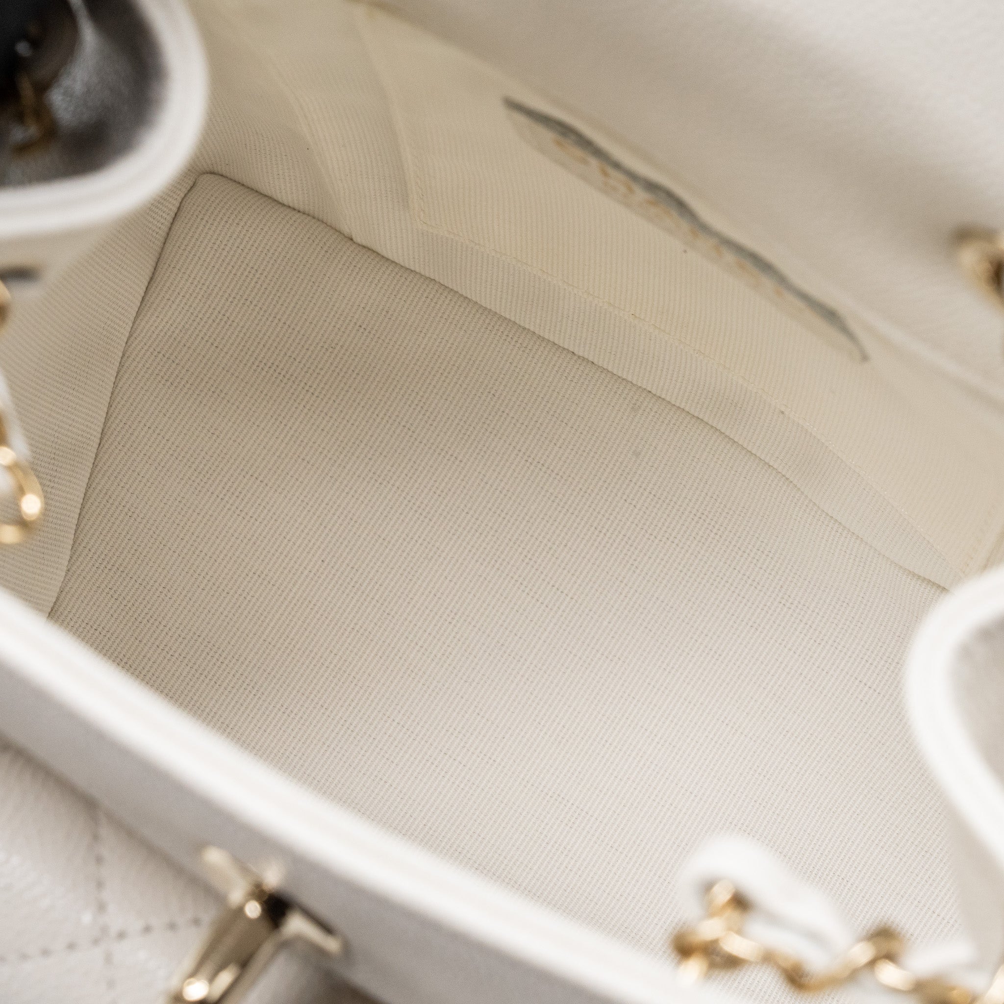 copy-of-chanel-23k-triple-pocket-mini-backpack-caviar-white-lghwmicrochip