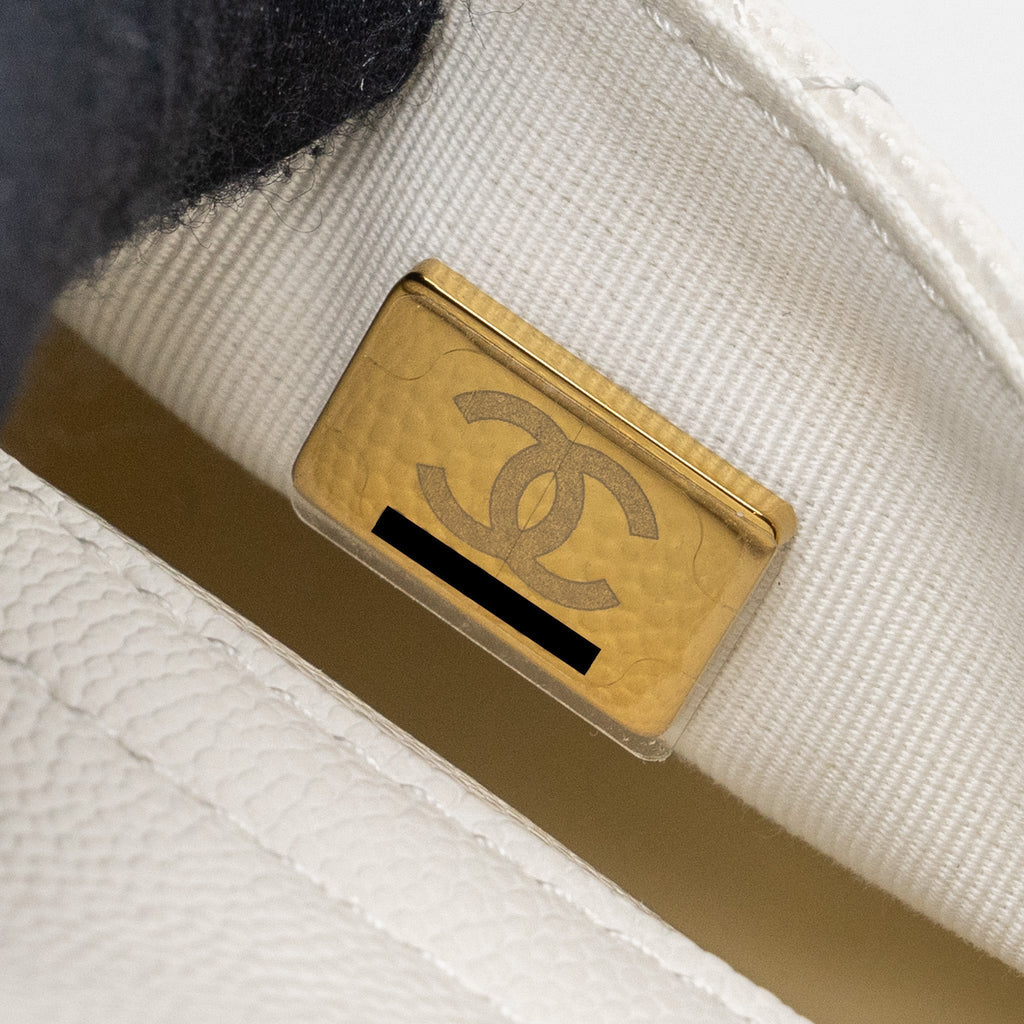 copy-of-chanel-23k-triple-pocket-mini-backpack-caviar-white-lghwmicrochip