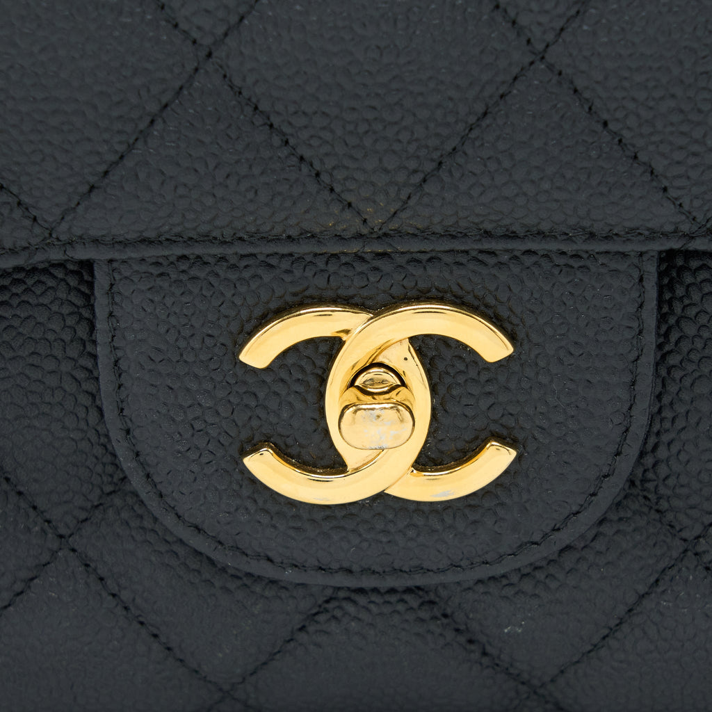 chanel-classic-jumbo-flap-bag-caviar-black-ghw-1