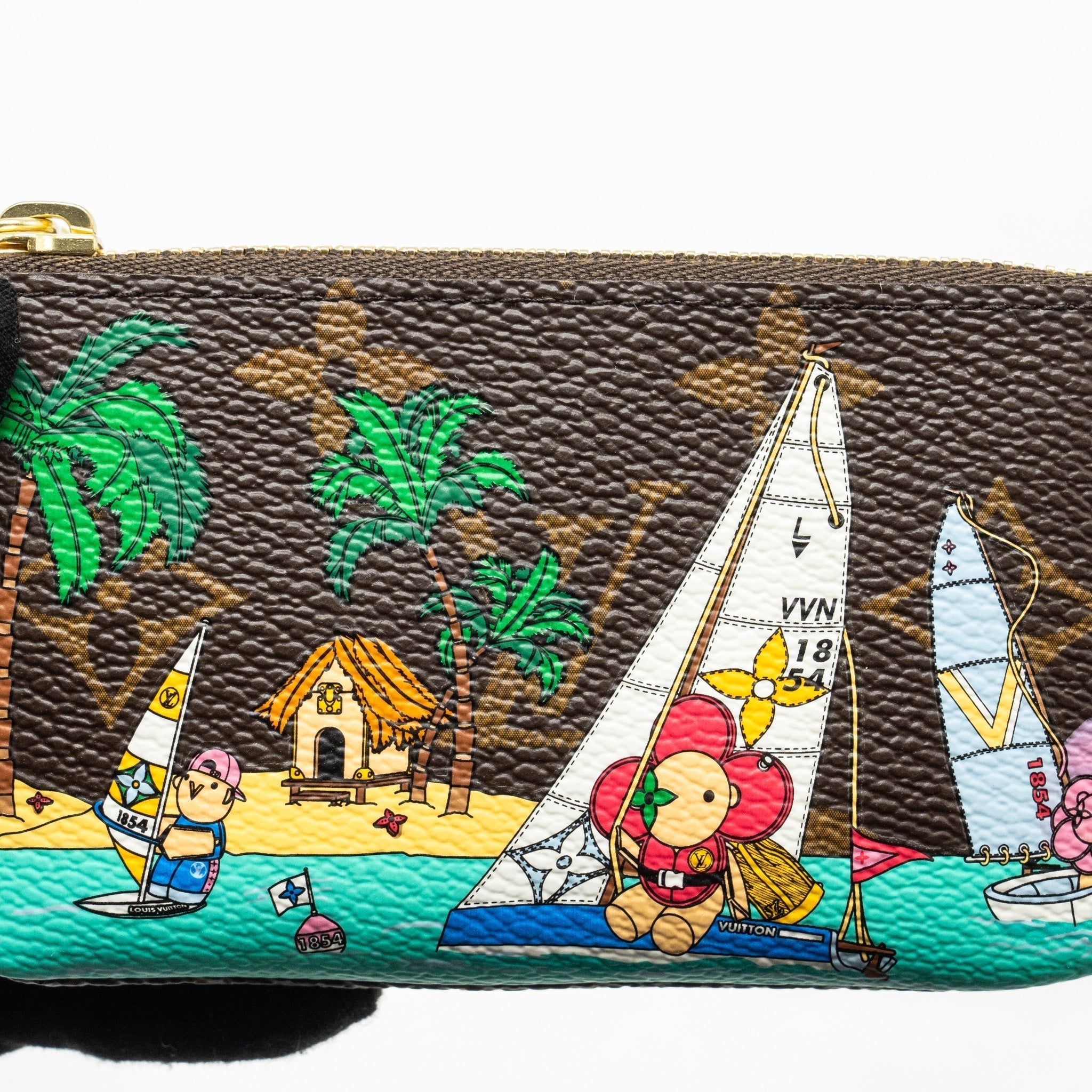 louis-vuitton-2023-christmas-animation-sailing-key-pouch-monogram-canvas-multicolour-ghw