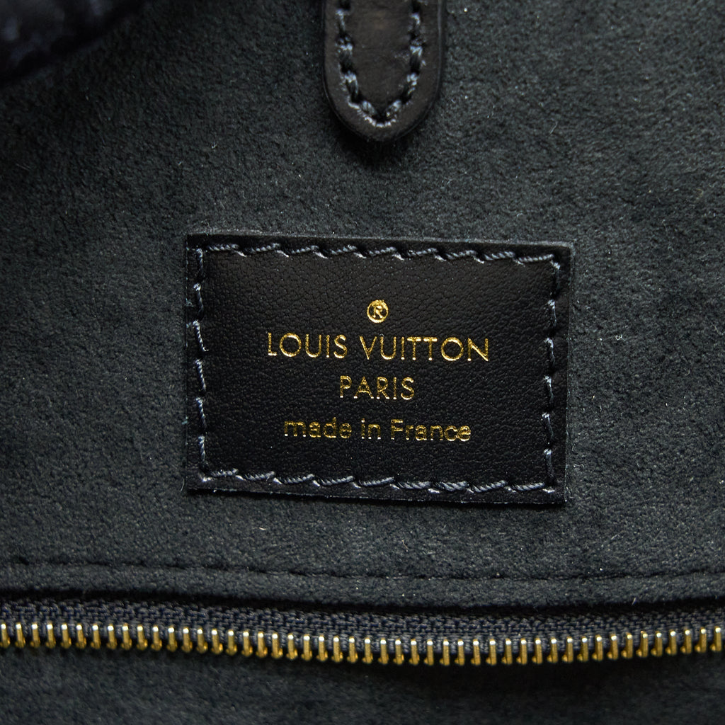 louis-vuitton-onthego-mm-empreinte-cream-black-ghw-new-version