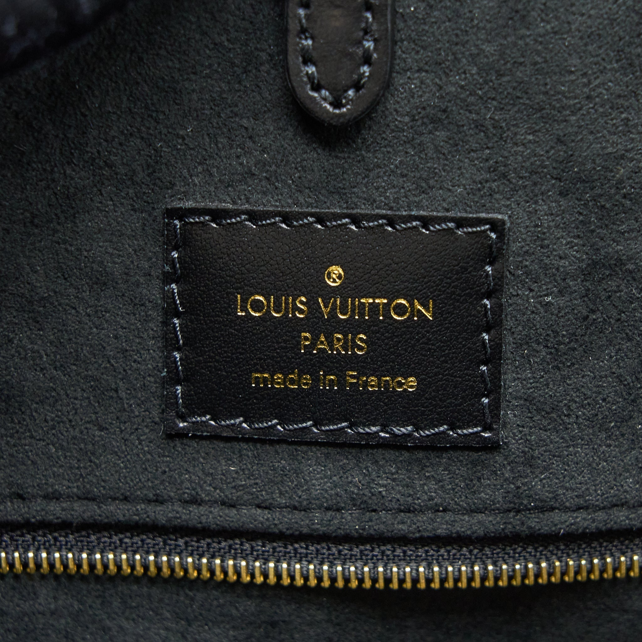 louis-vuitton-onthego-mm-empreinte-cream-black-ghw-new-version