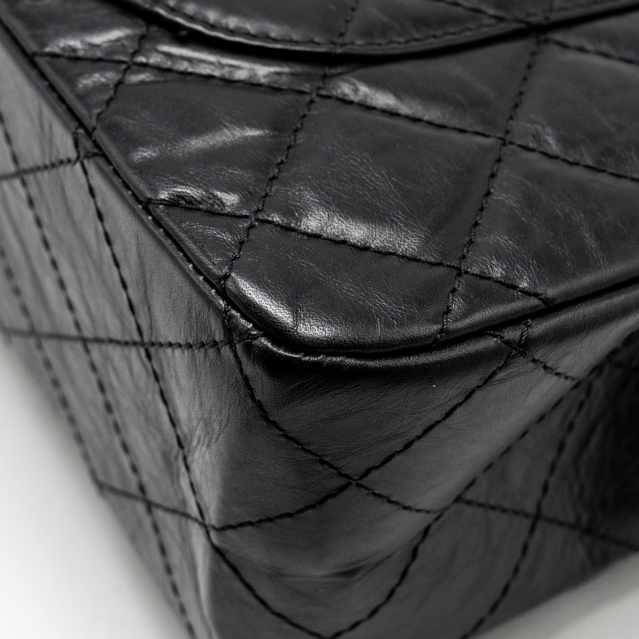 chanel-maxi-2-55-reissue-flap-bag-aged-calfskin-black-ghw-1