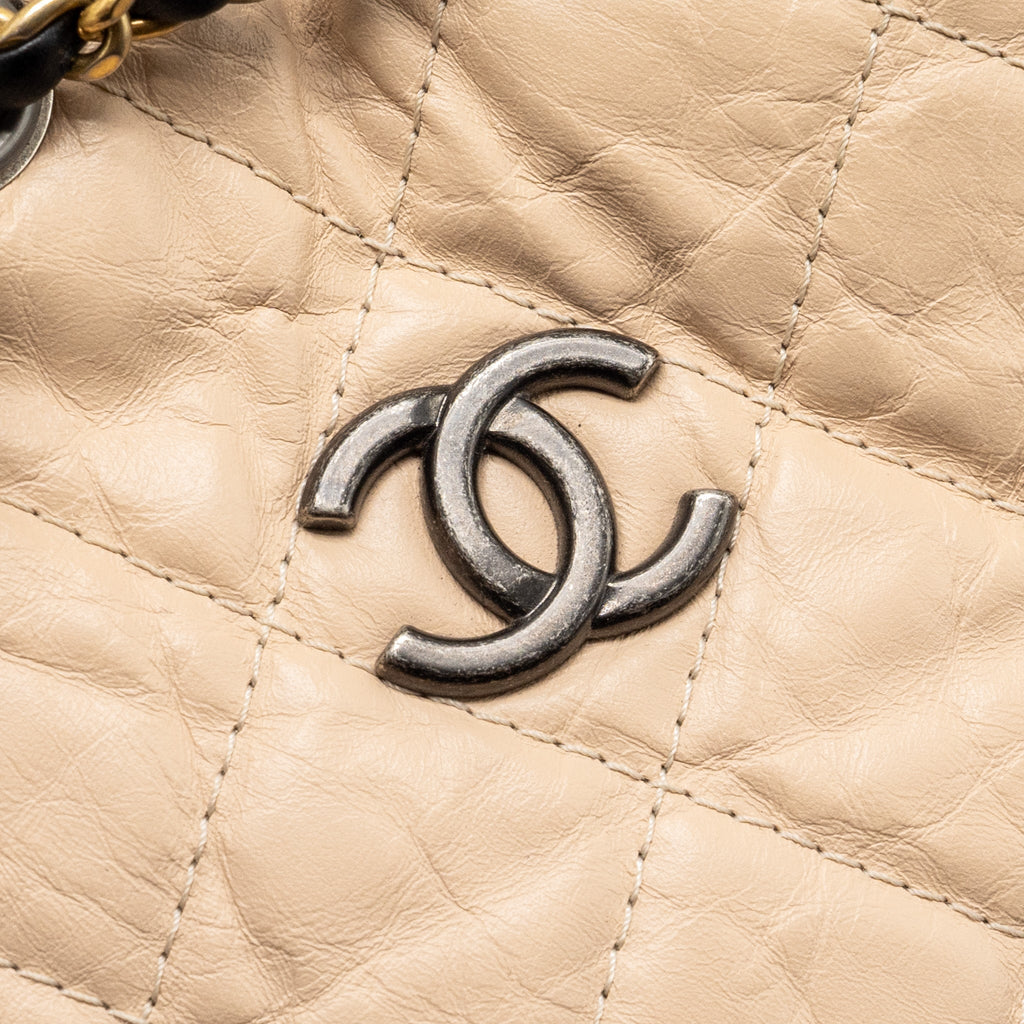 chanel-medium-gabrielle-backpack-aged-calfskin-beige-black-multicolour-hardware