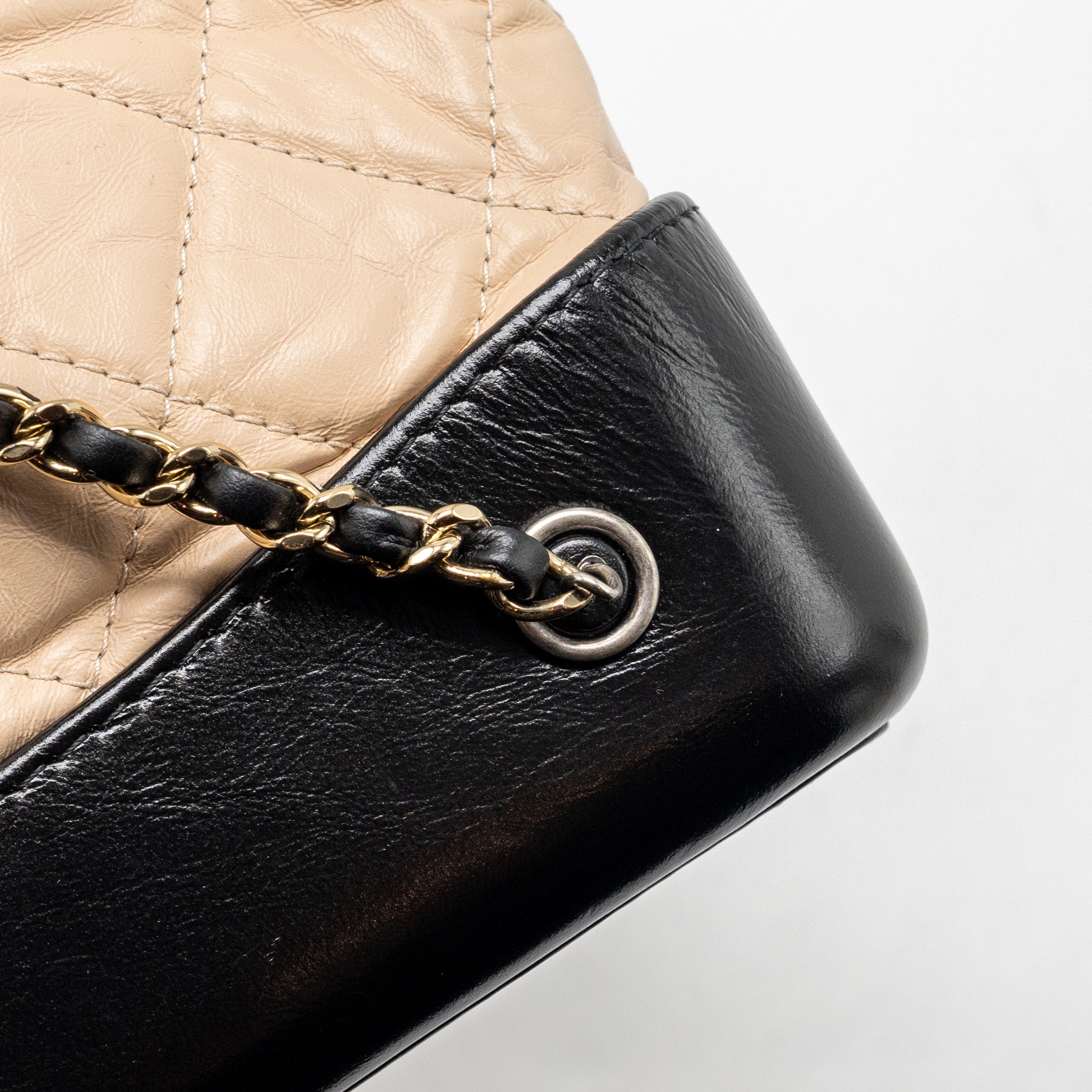 chanel-medium-gabrielle-backpack-aged-calfskin-beige-black-multicolour-hardware