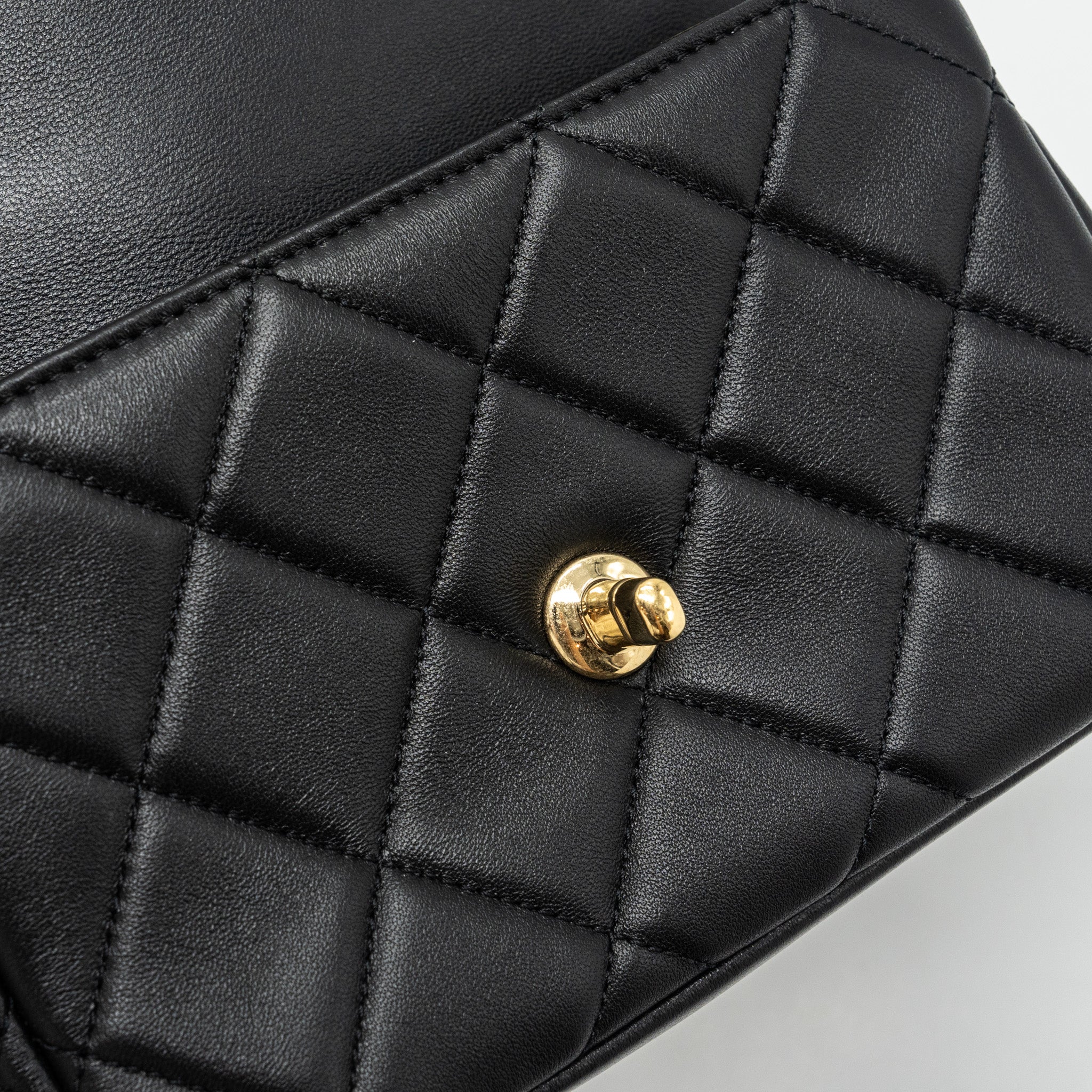 chanel-logo-chain-handle-flap-bag-lambskin-black-ghwmicrochip