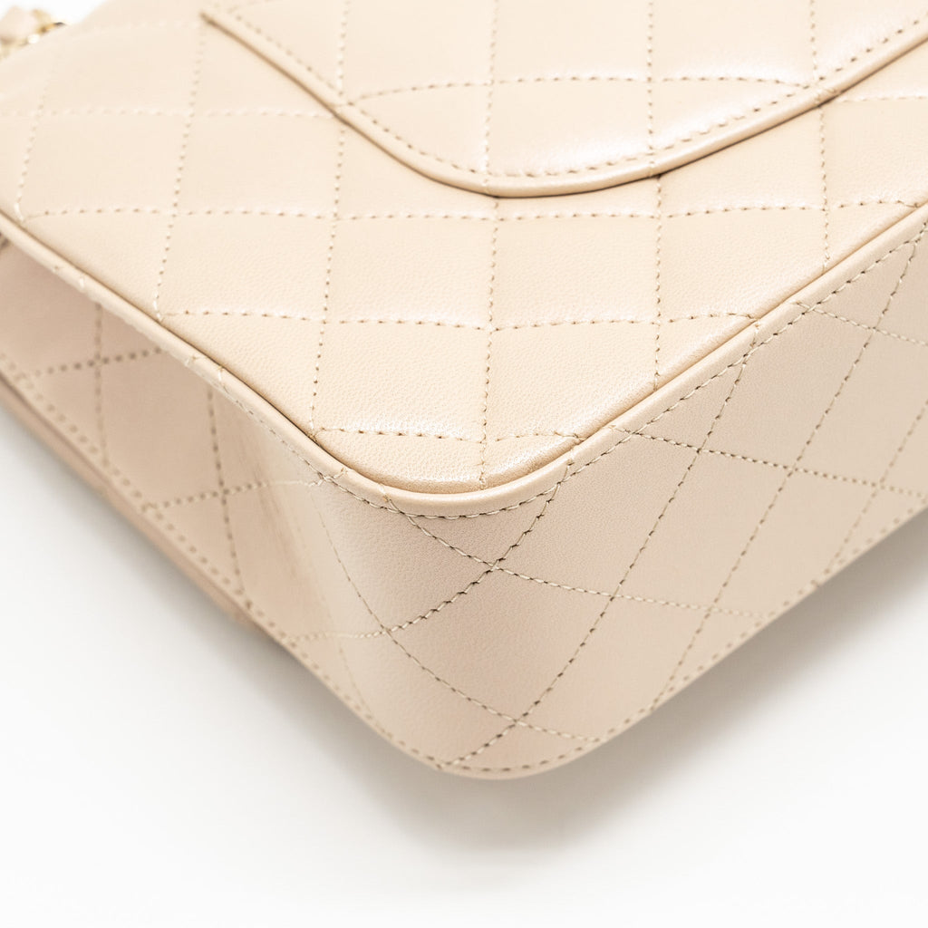 chanel-medium-classic-double-flap-bag-lambskin-iridescent-ivory-lghw-copy