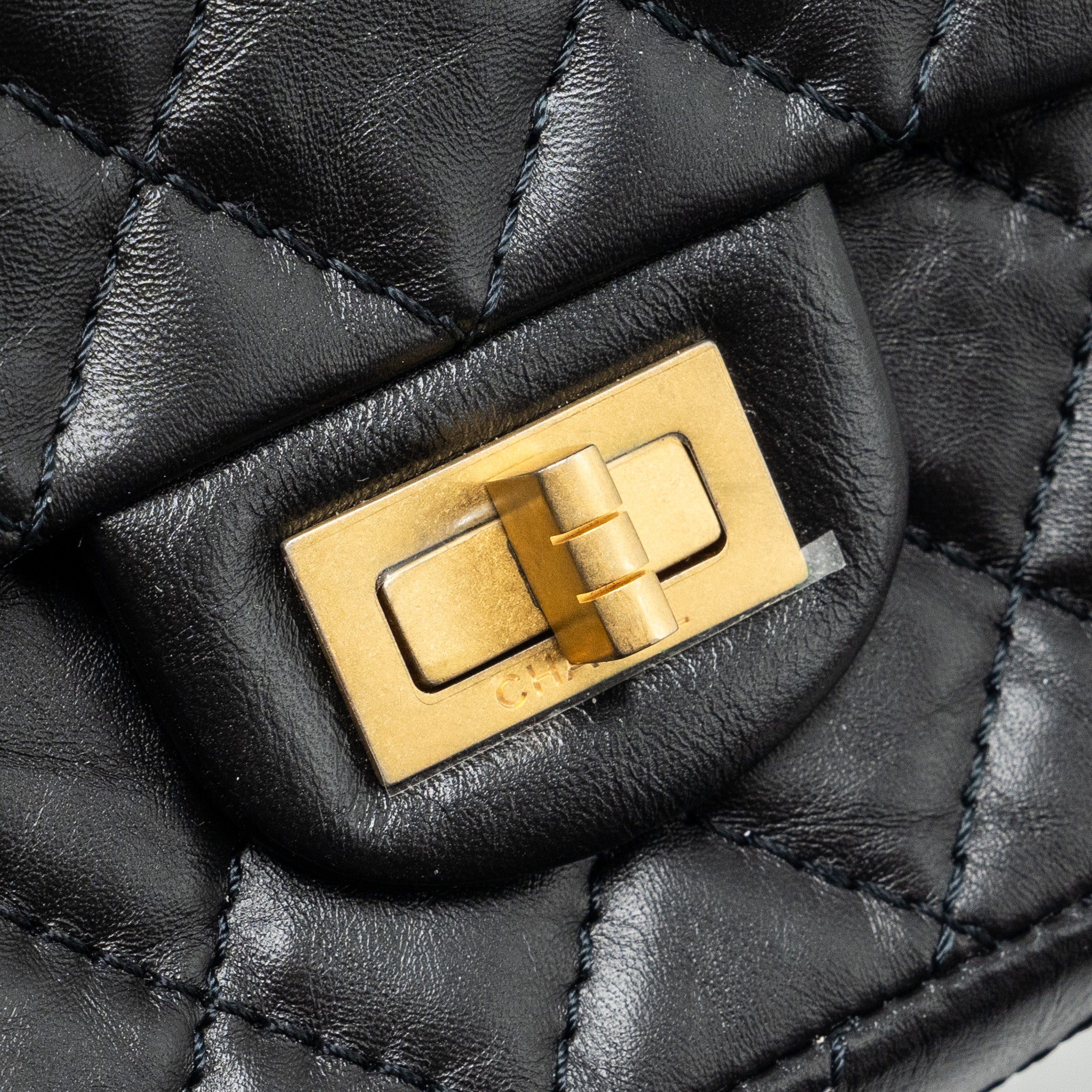 chanel-mini-2-55-reissue-flap-bag-aged-calfskin-black-ghw-2