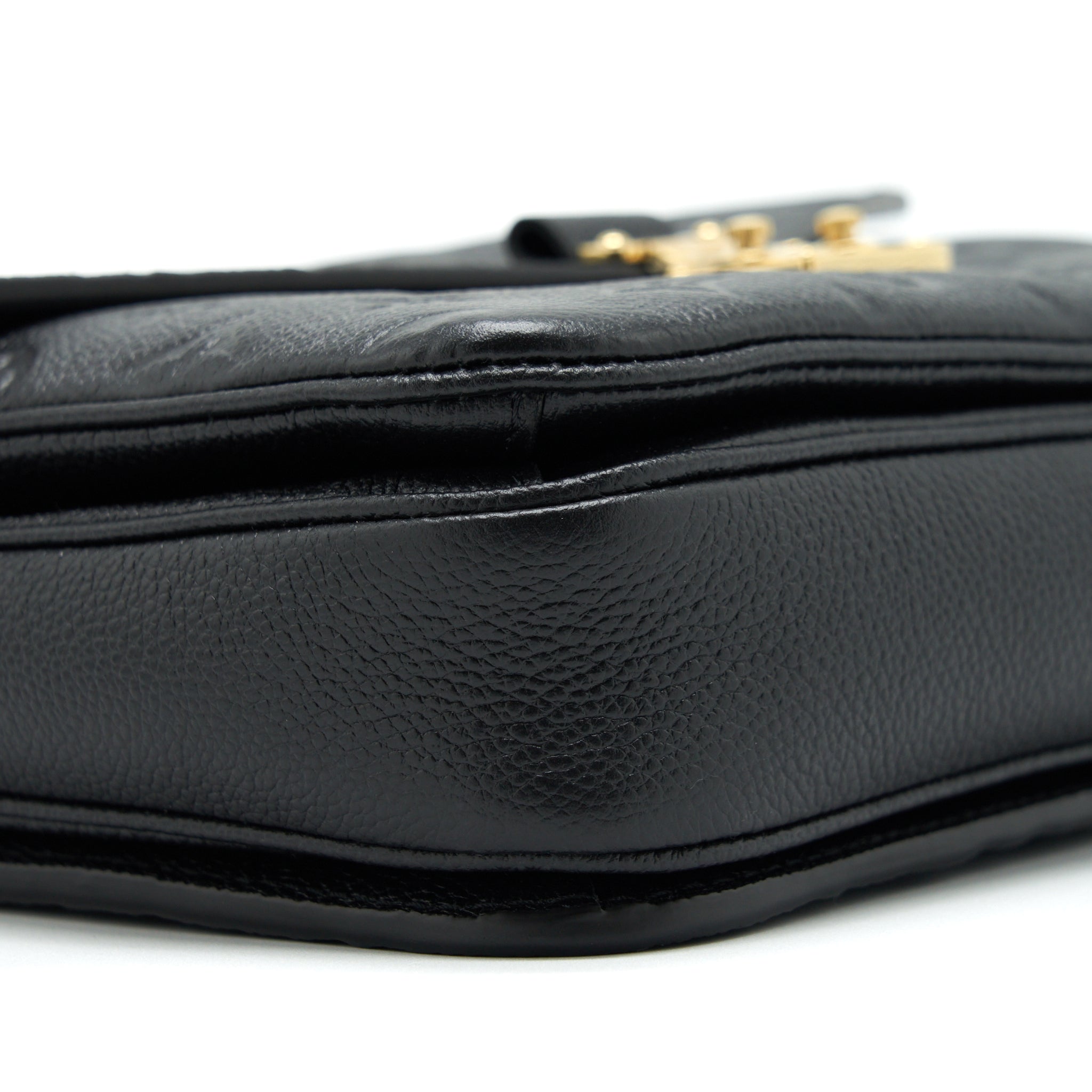 louis-vuitton-pochette-metis-monogram-empreinte-black-ghw