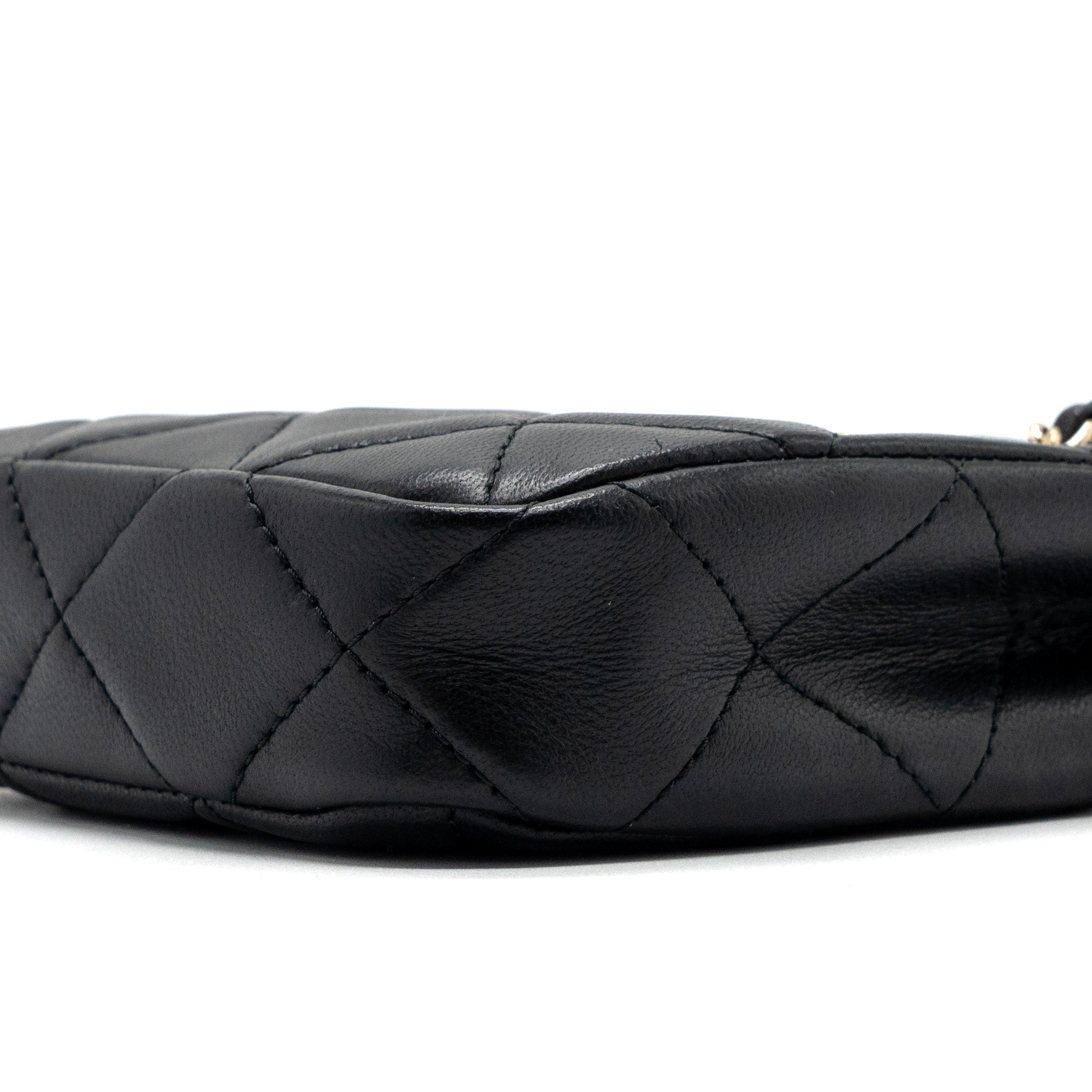 copy-of-chanel-quilted-super-mini-tote-with-chain-lambskin-black-lghw
