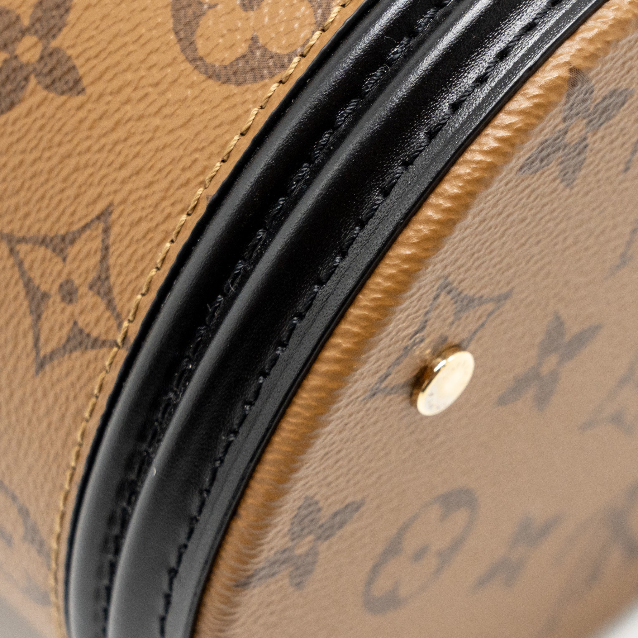 louis-vuitton-cannes-monogram-reverse-canvas-ghw-11