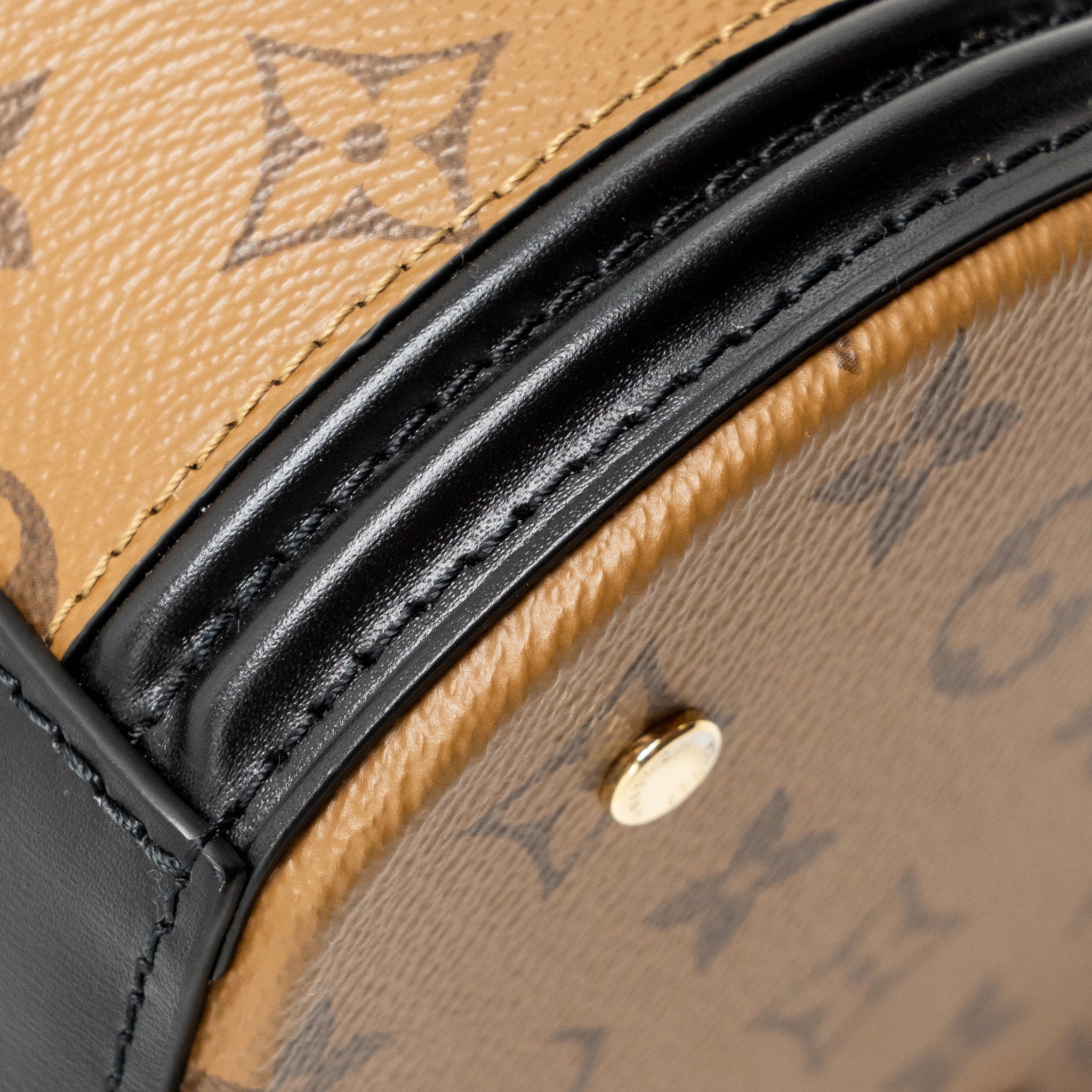 louis-vuitton-cannes-monogram-reverse-canvas-ghw-11