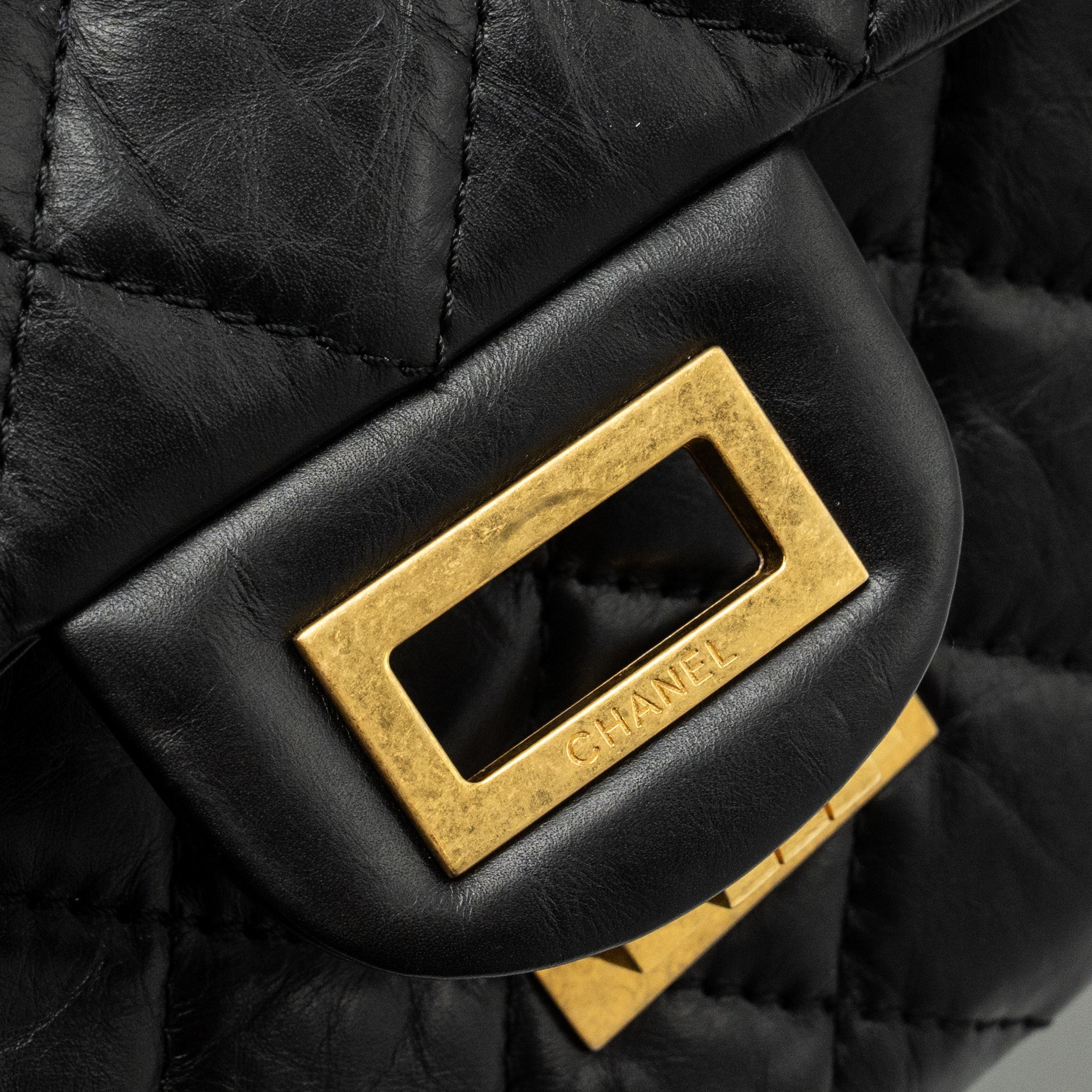 chanel-maxi-2-55-reissue-flap-bag-aged-calfskin-black-ghw-1