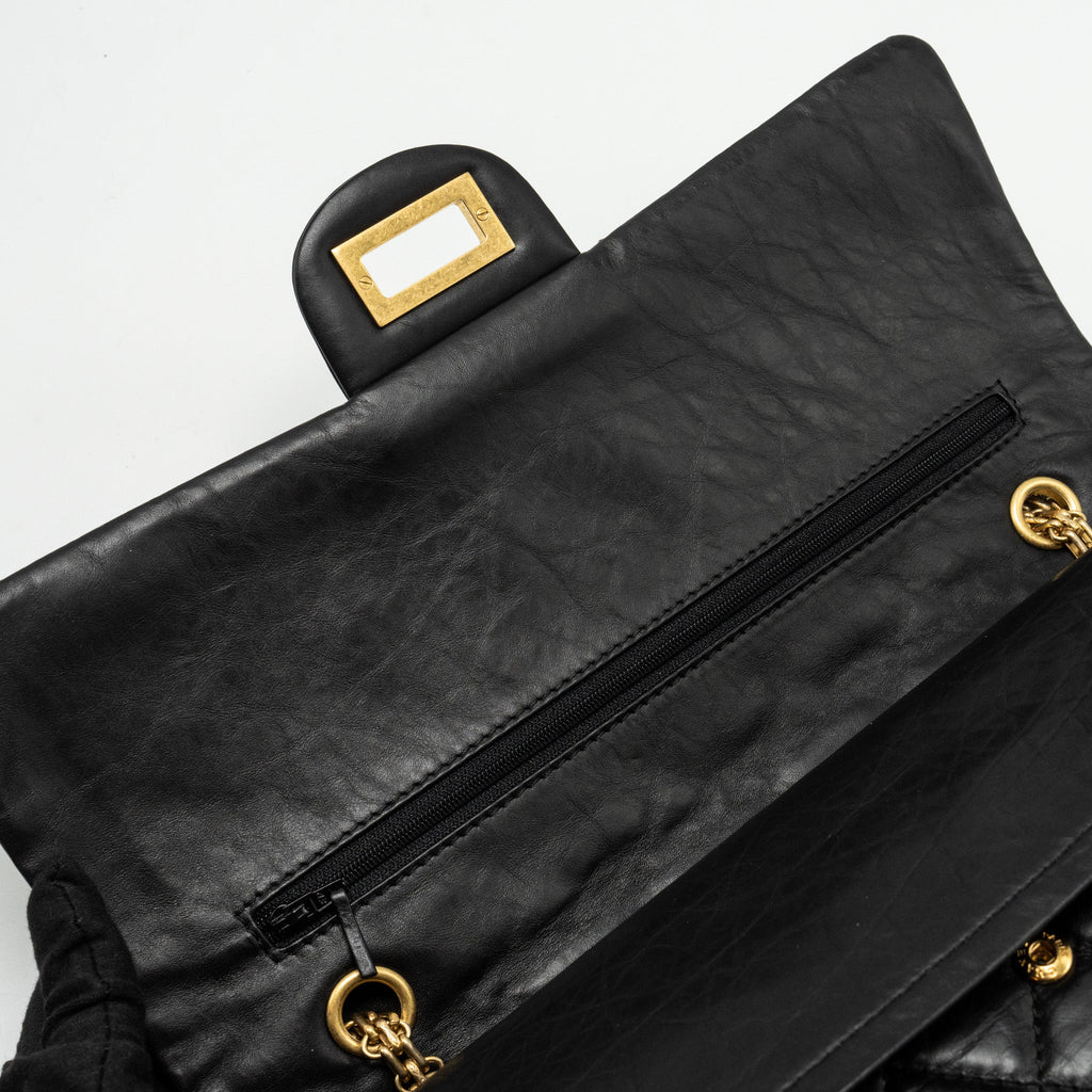 chanel-maxi-2-55-reissue-flap-bag-aged-calfskin-black-ghw-1
