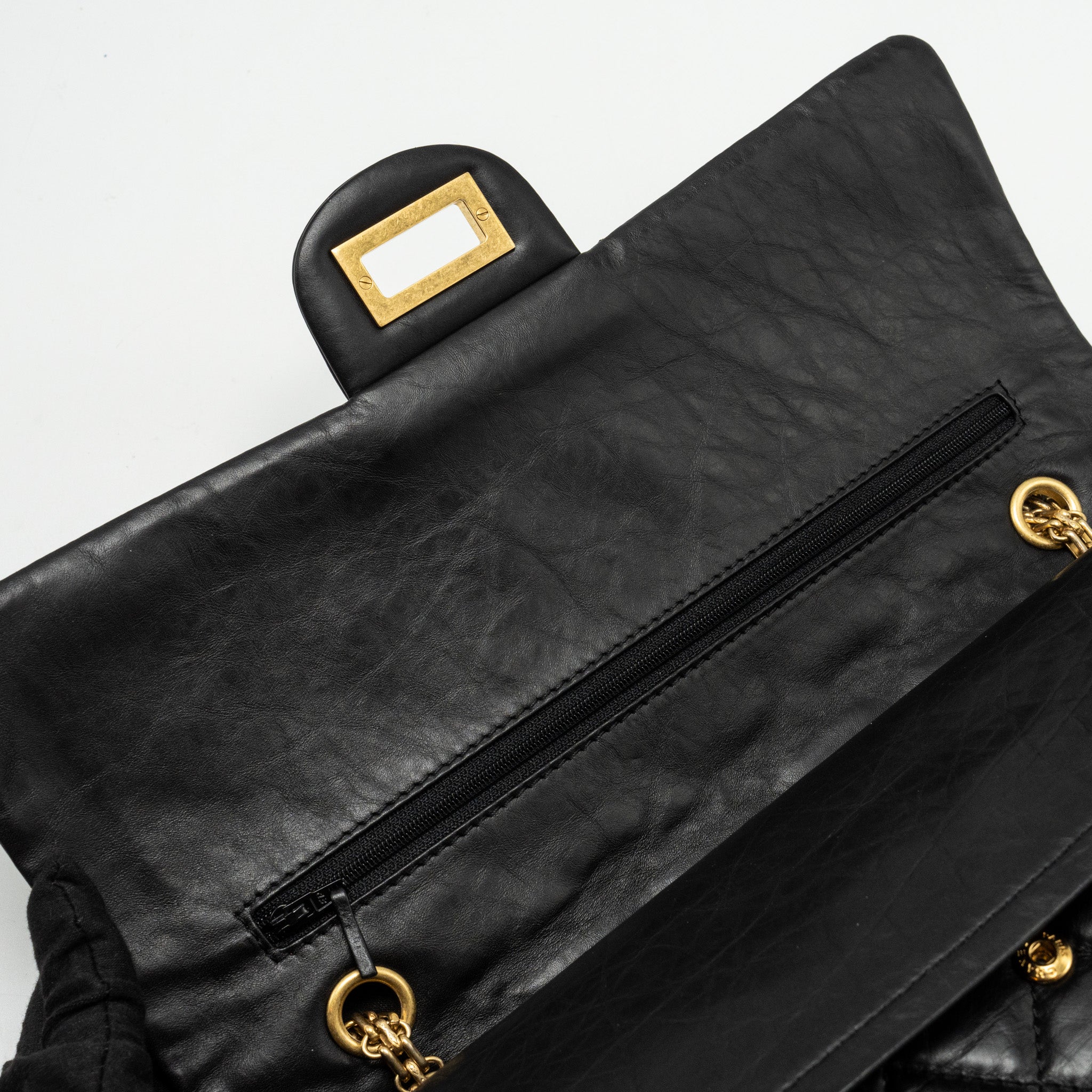 chanel-maxi-2-55-reissue-flap-bag-aged-calfskin-black-ghw-1