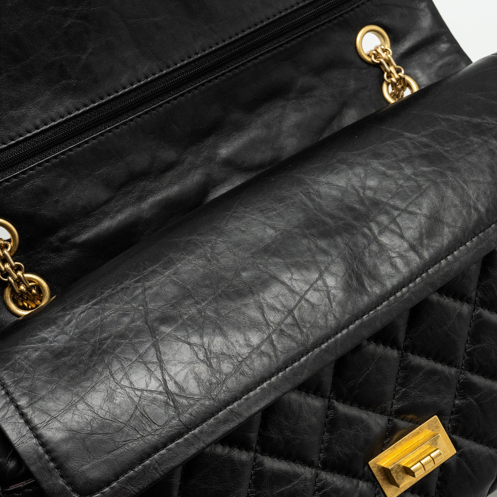chanel-maxi-2-55-reissue-flap-bag-aged-calfskin-black-ghw-1