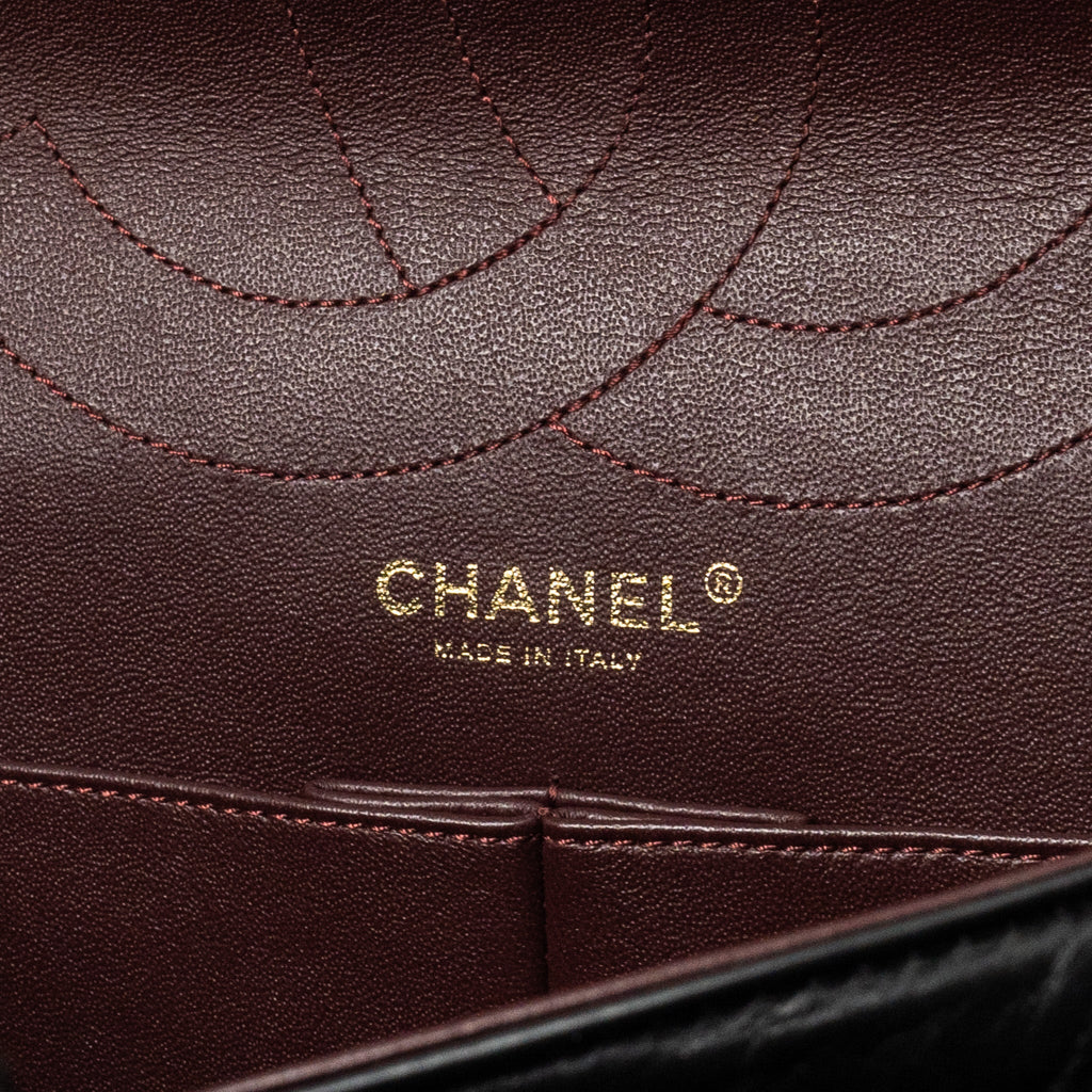 chanel-maxi-2-55-reissue-flap-bag-aged-calfskin-black-ghw-1