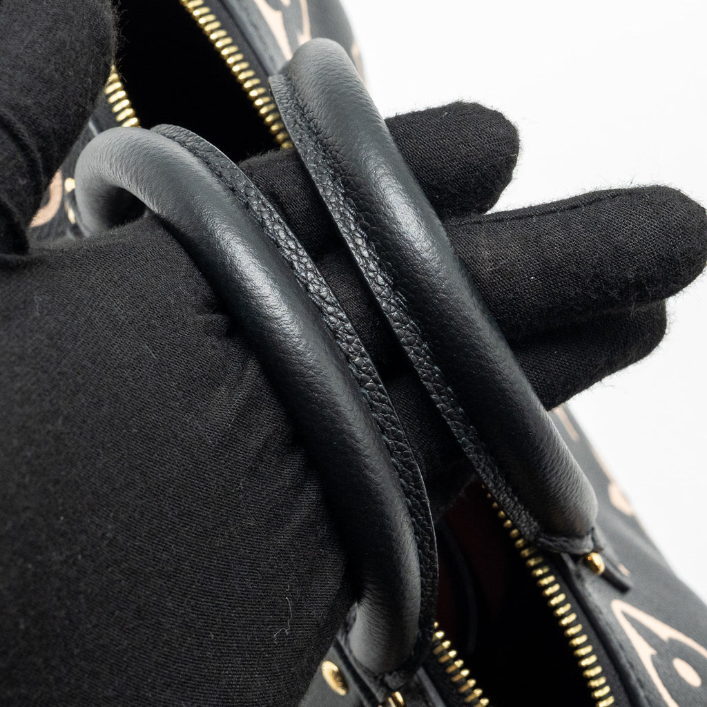 louis-vuttion-speedy-bandouliere-25-bicolour-monogram-empreinte-leather-ghw