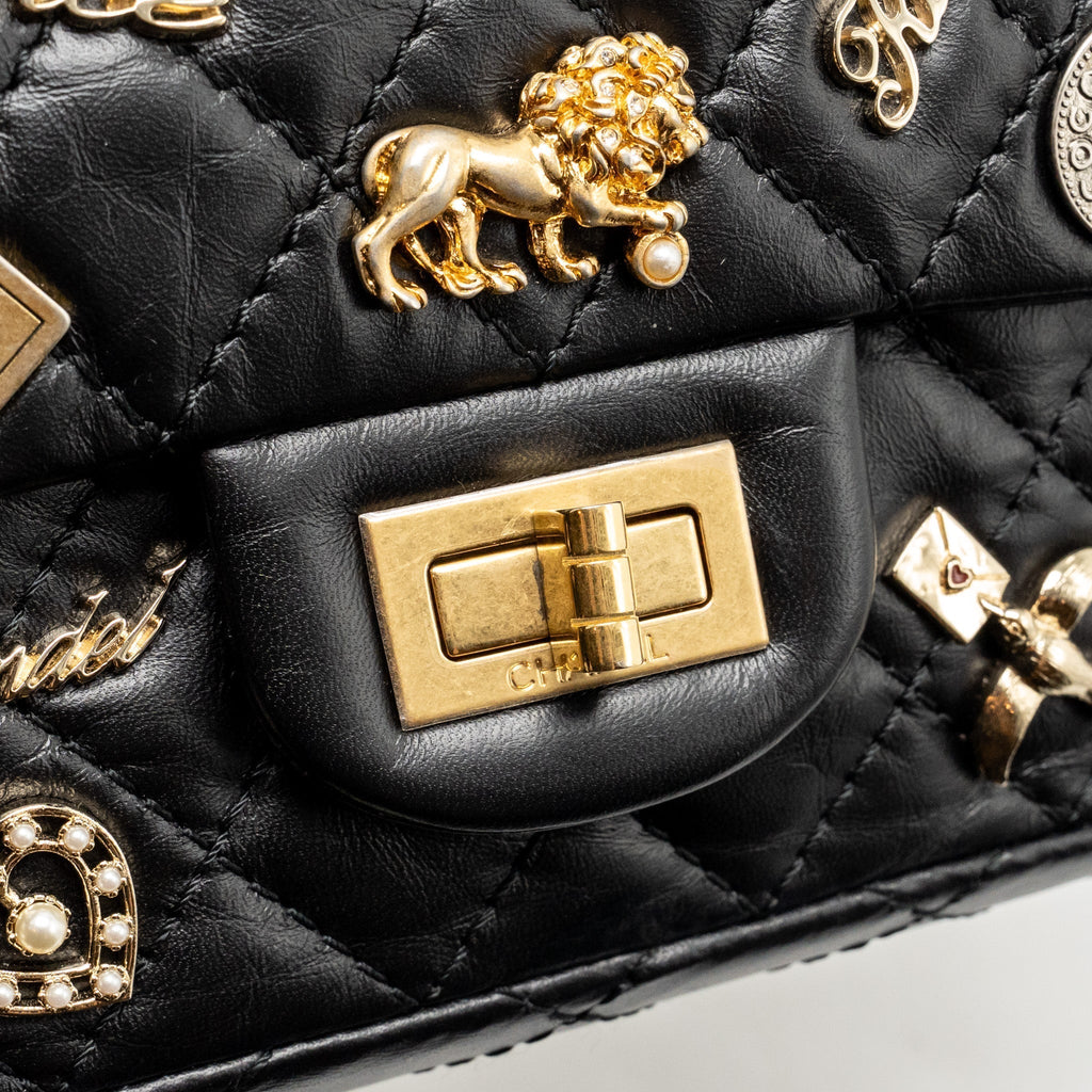 chanel-mini-2-55-reissue-flap-bag-lucky-charms-aged-calfskin-black-ghw