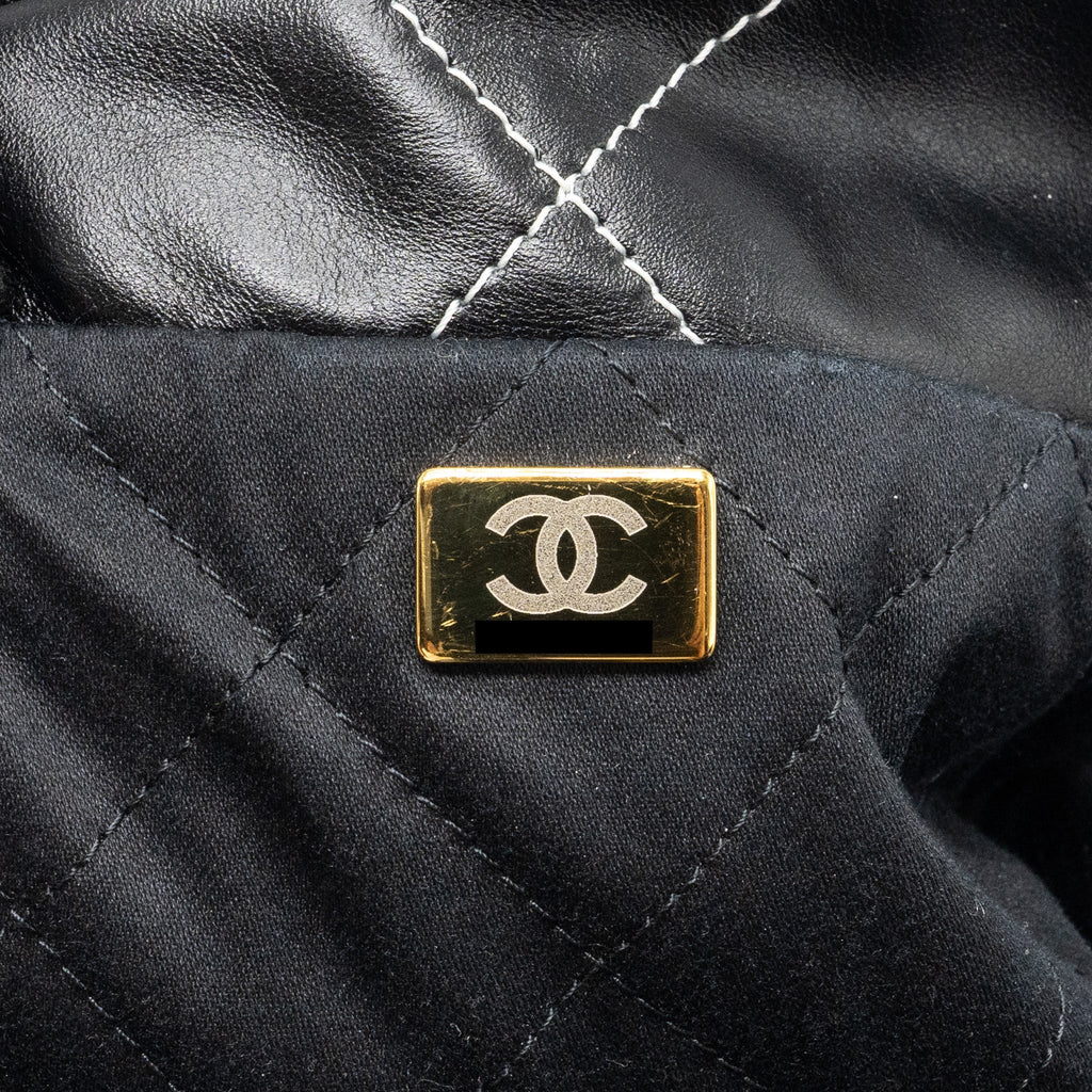 chanel-medium-22-bag-shiny-calfskin-black-with-white-stitching-gold-letter-ghw