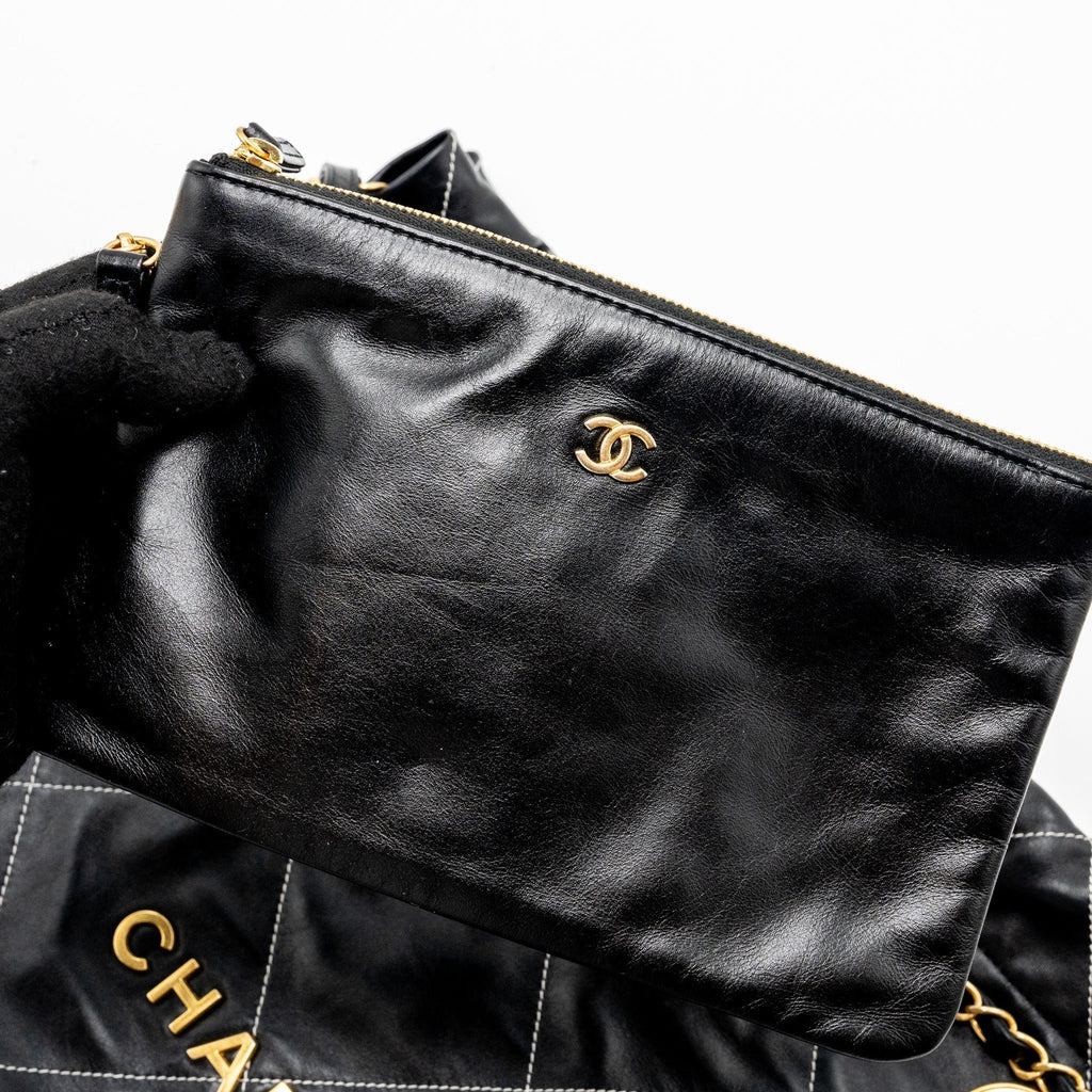 chanel-medium-22-bag-shiny-calfskin-black-with-white-stitching-gold-letter-ghw