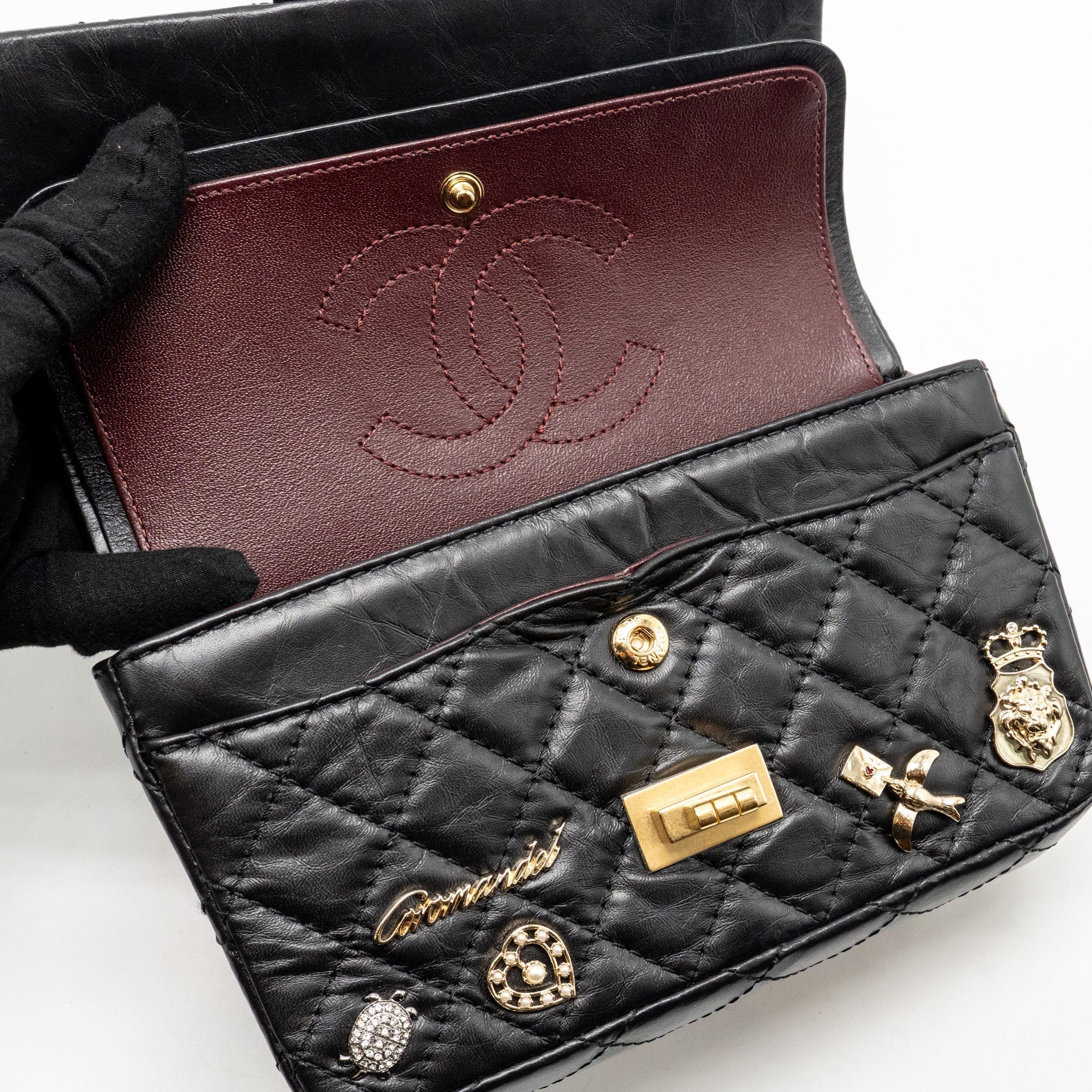 chanel-mini-2-55-reissue-flap-bag-lucky-charms-aged-calfskin-black-ghw