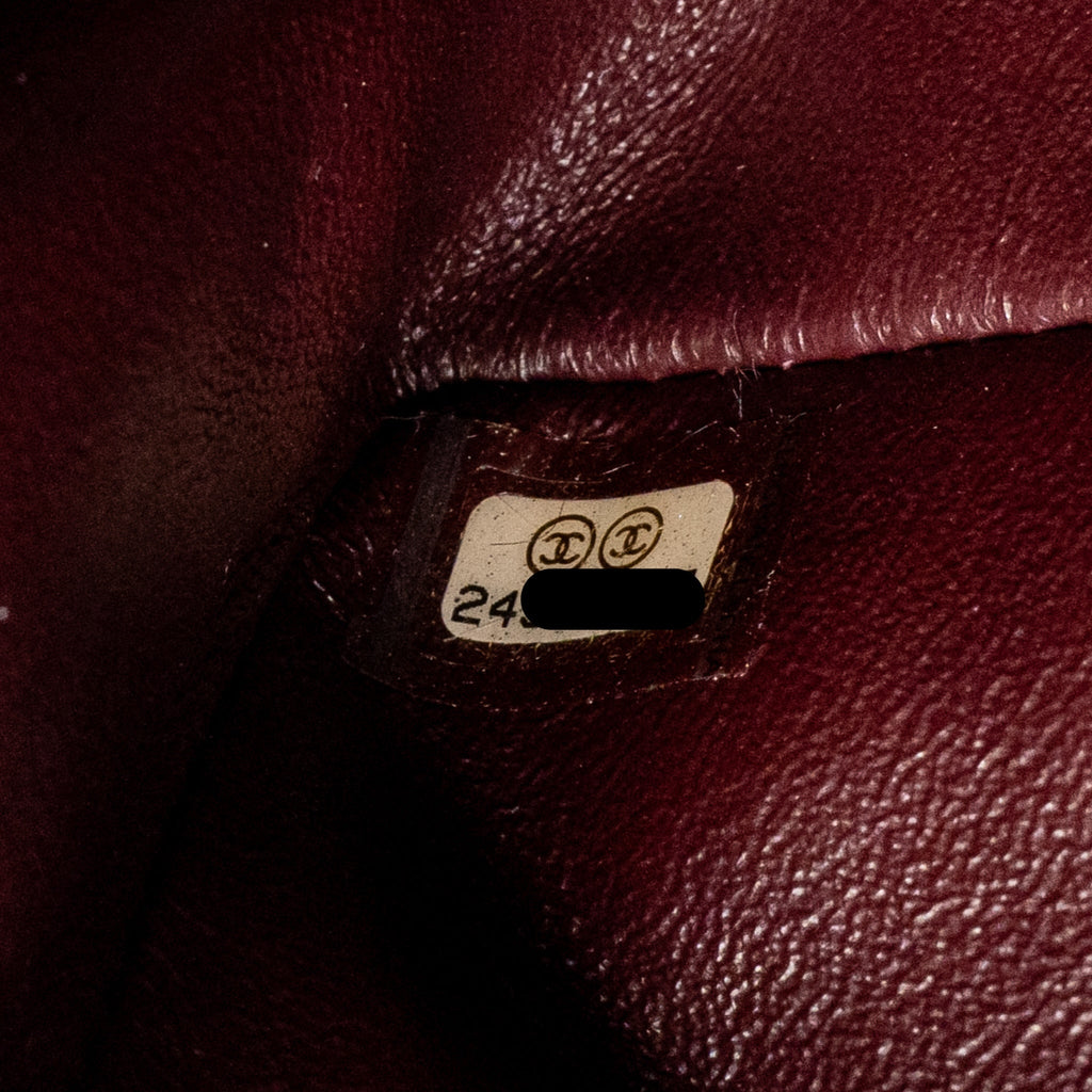 chanel-mini-2-55-reissue-flap-bag-lucky-charms-aged-calfskin-black-ghw