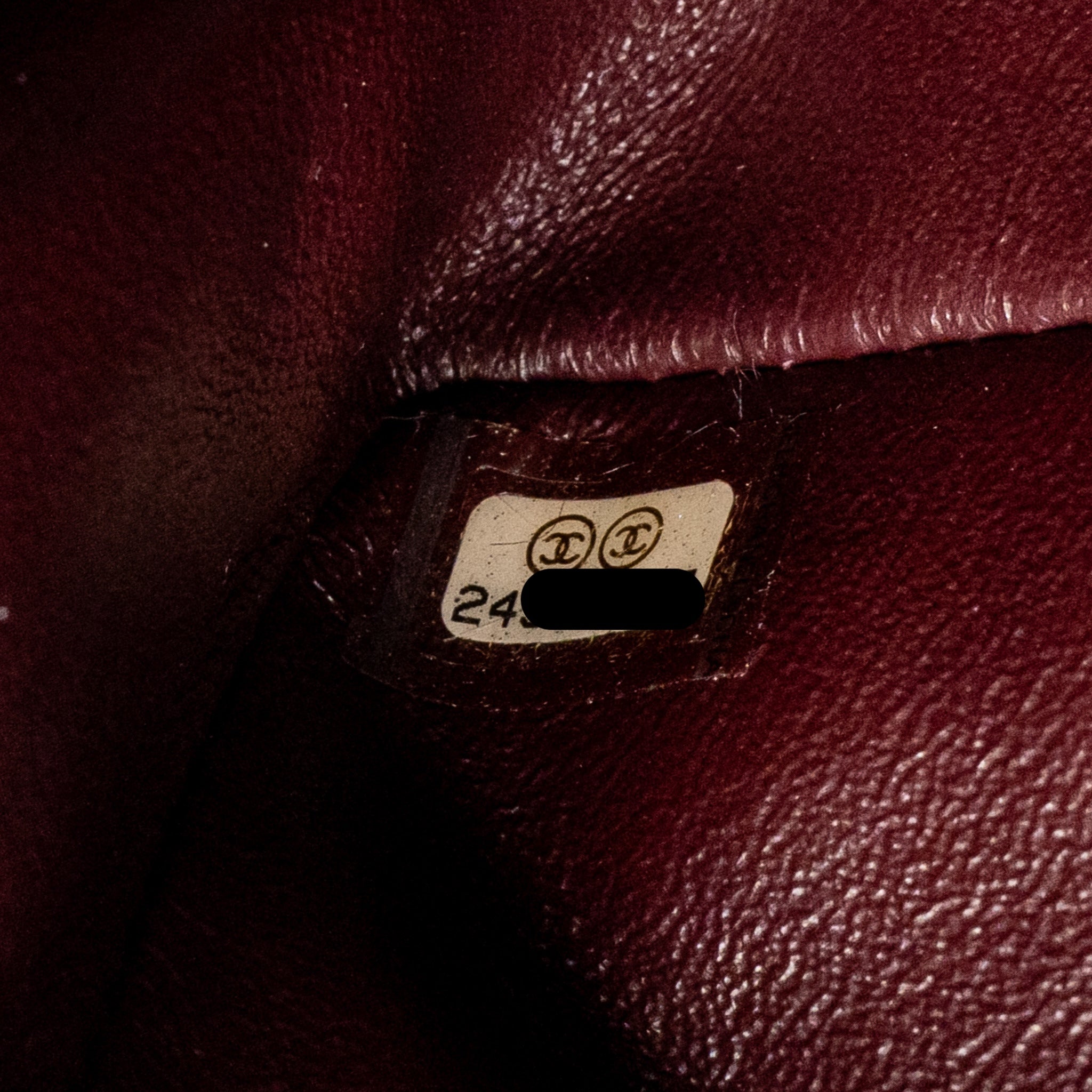 chanel-mini-2-55-reissue-flap-bag-lucky-charms-aged-calfskin-black-ghw