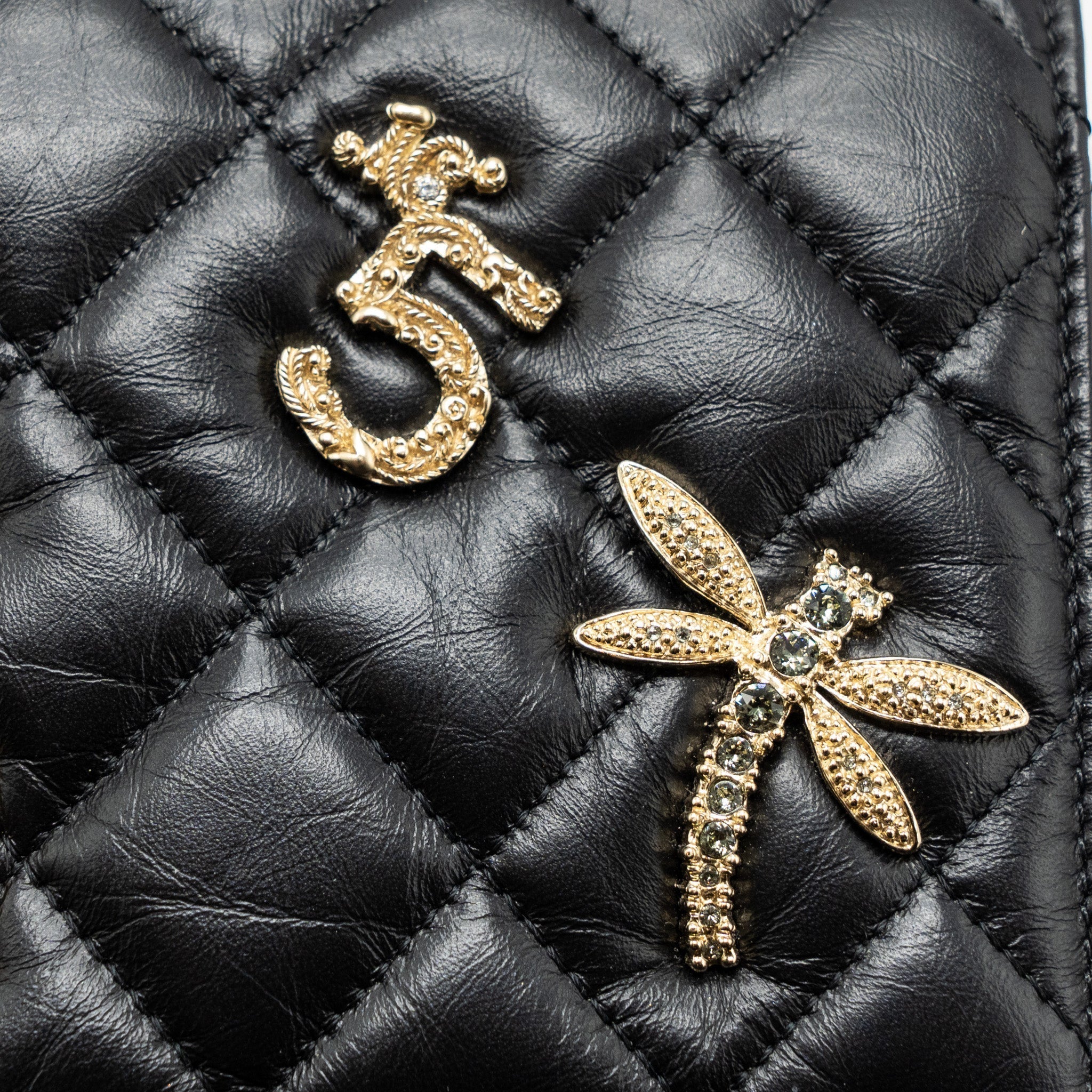 chanel-2-55-reissue-lucky-charms-wallet-on-chain-aged-calfskin-black-ghw