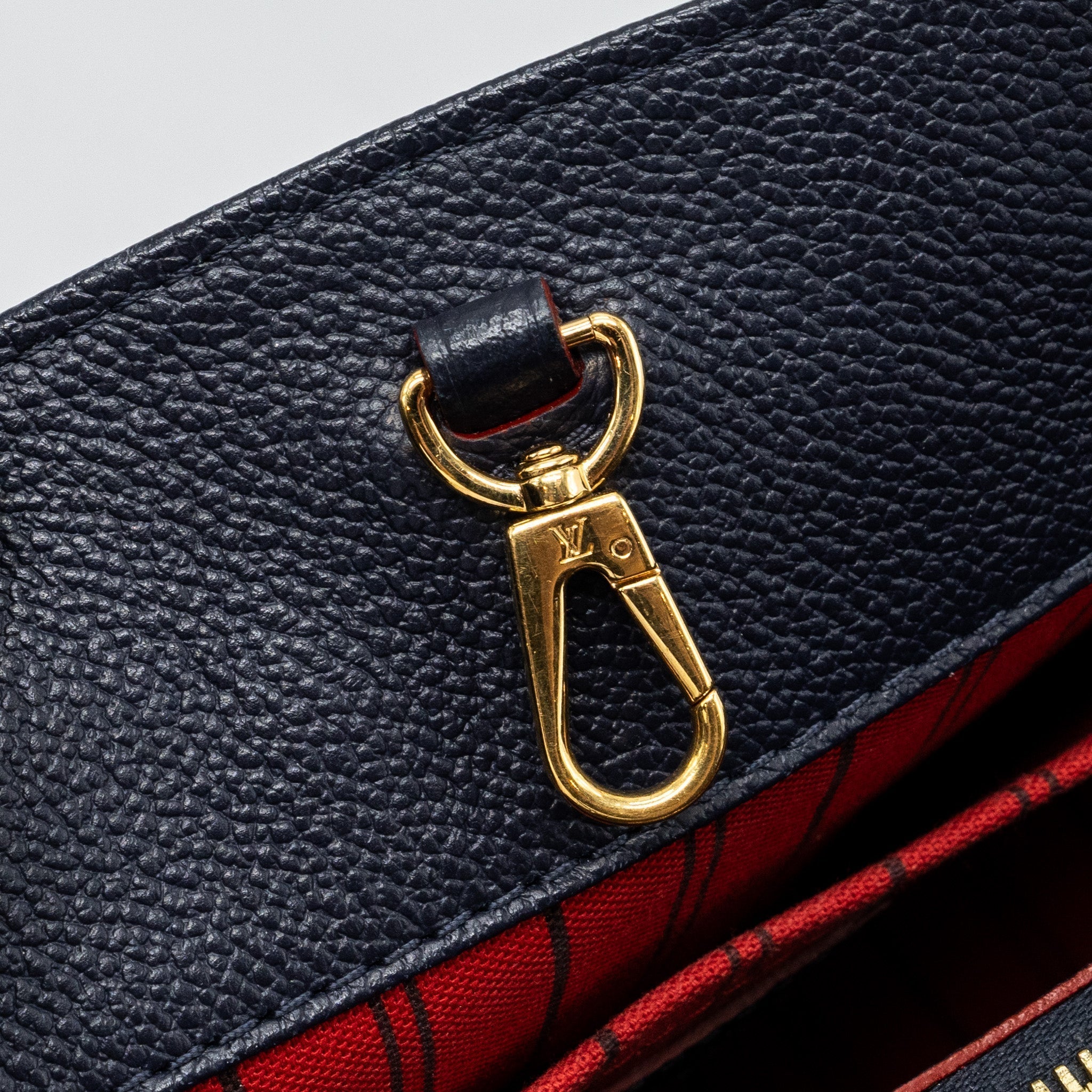 louis-vuitton-montaigne-mm-monogram-empreinte-navy-ghw