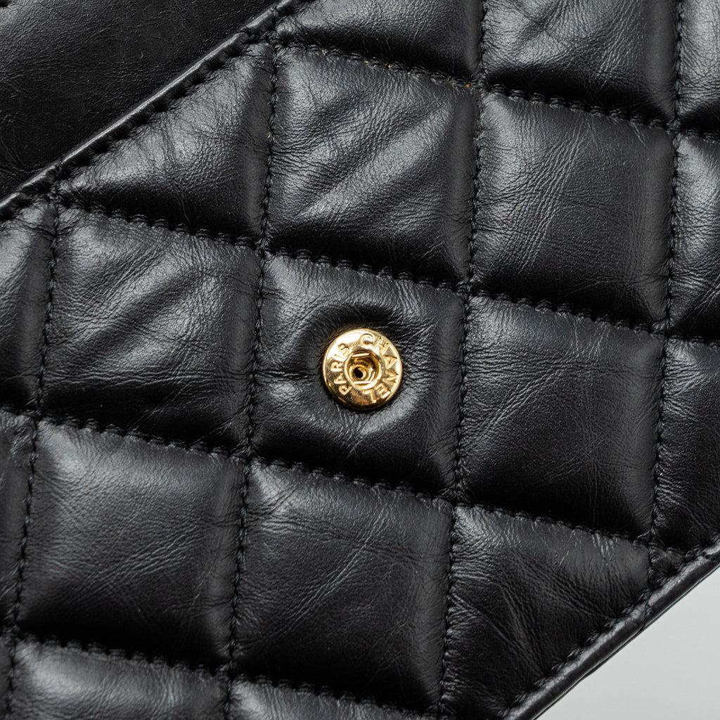 chanel-2-55-reissue-lucky-charms-wallet-on-chain-aged-calfskin-black-ghw