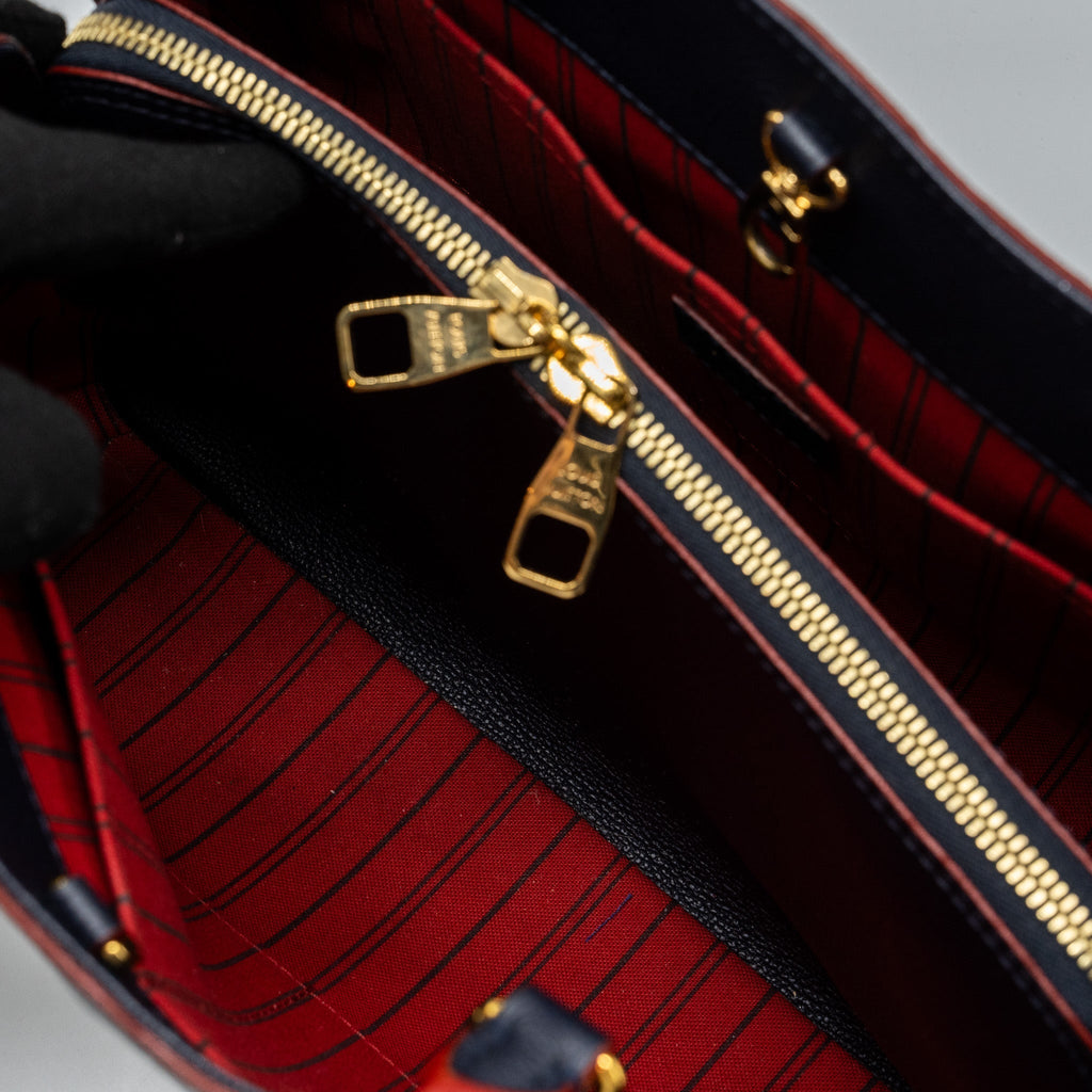 louis-vuitton-montaigne-mm-monogram-empreinte-navy-ghw