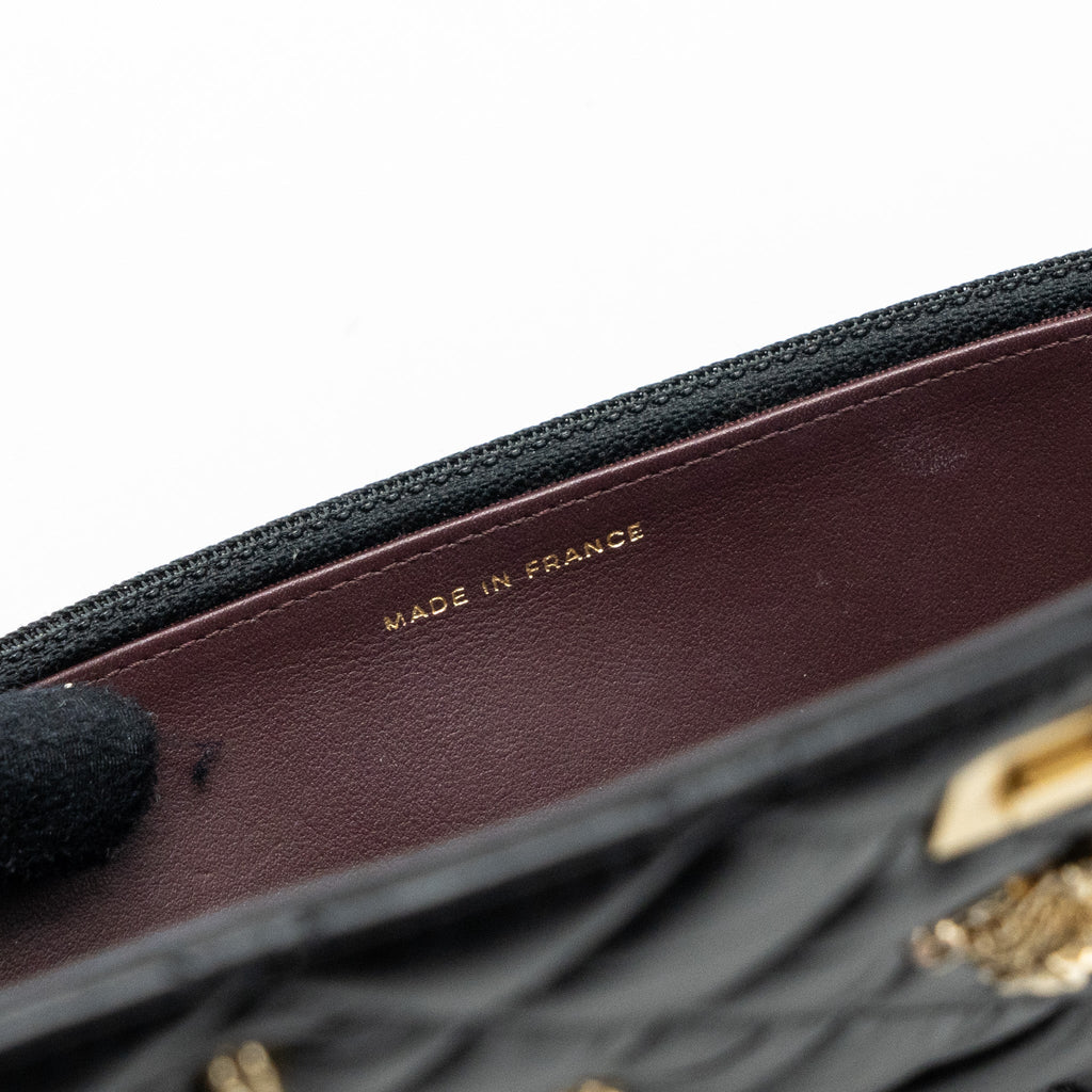 chanel-2-55-reissue-lucky-charms-wallet-on-chain-aged-calfskin-black-ghw
