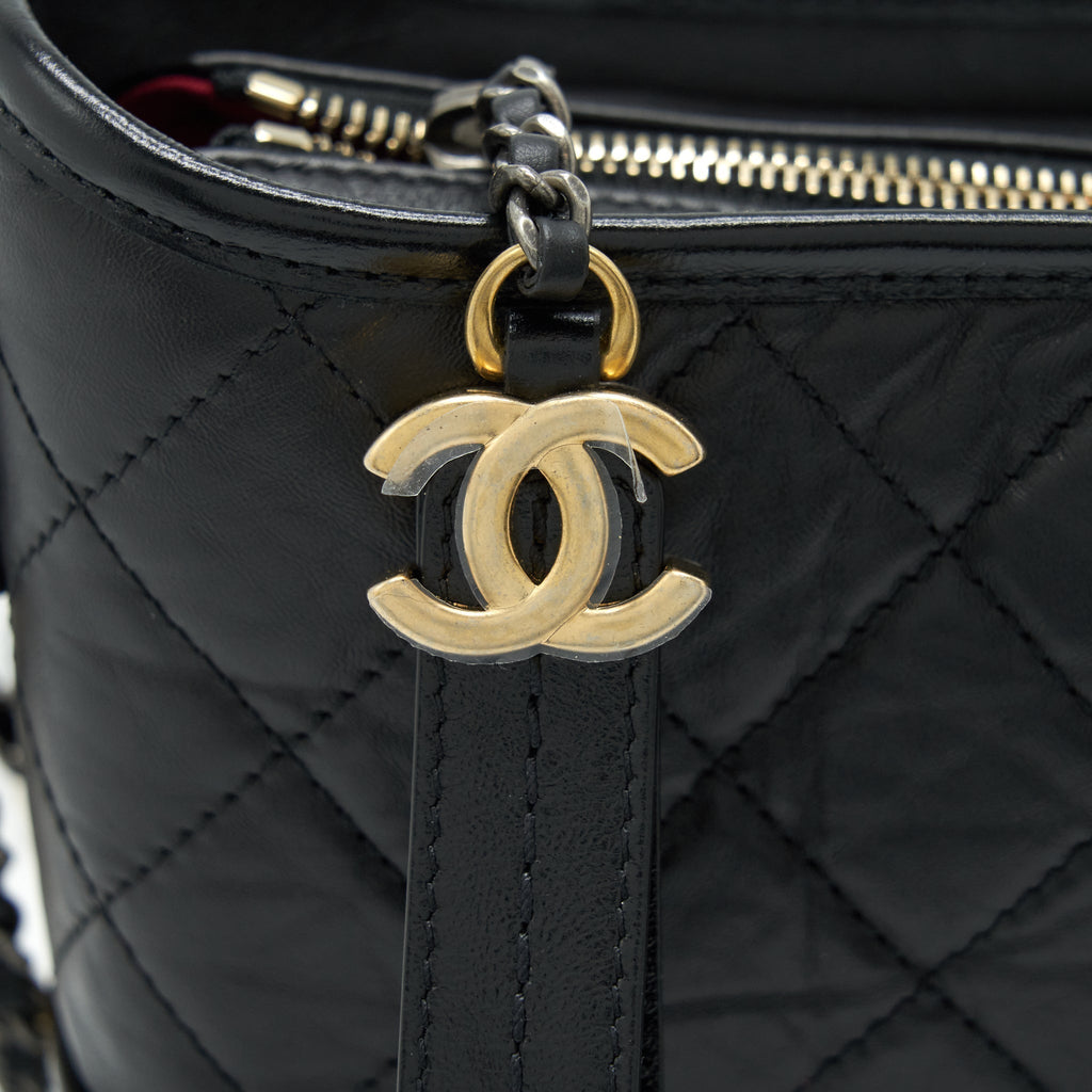 chanel-small-gabrielle-hobo-bag-calfskin-black-with-multicolour-hardware-microchip-1