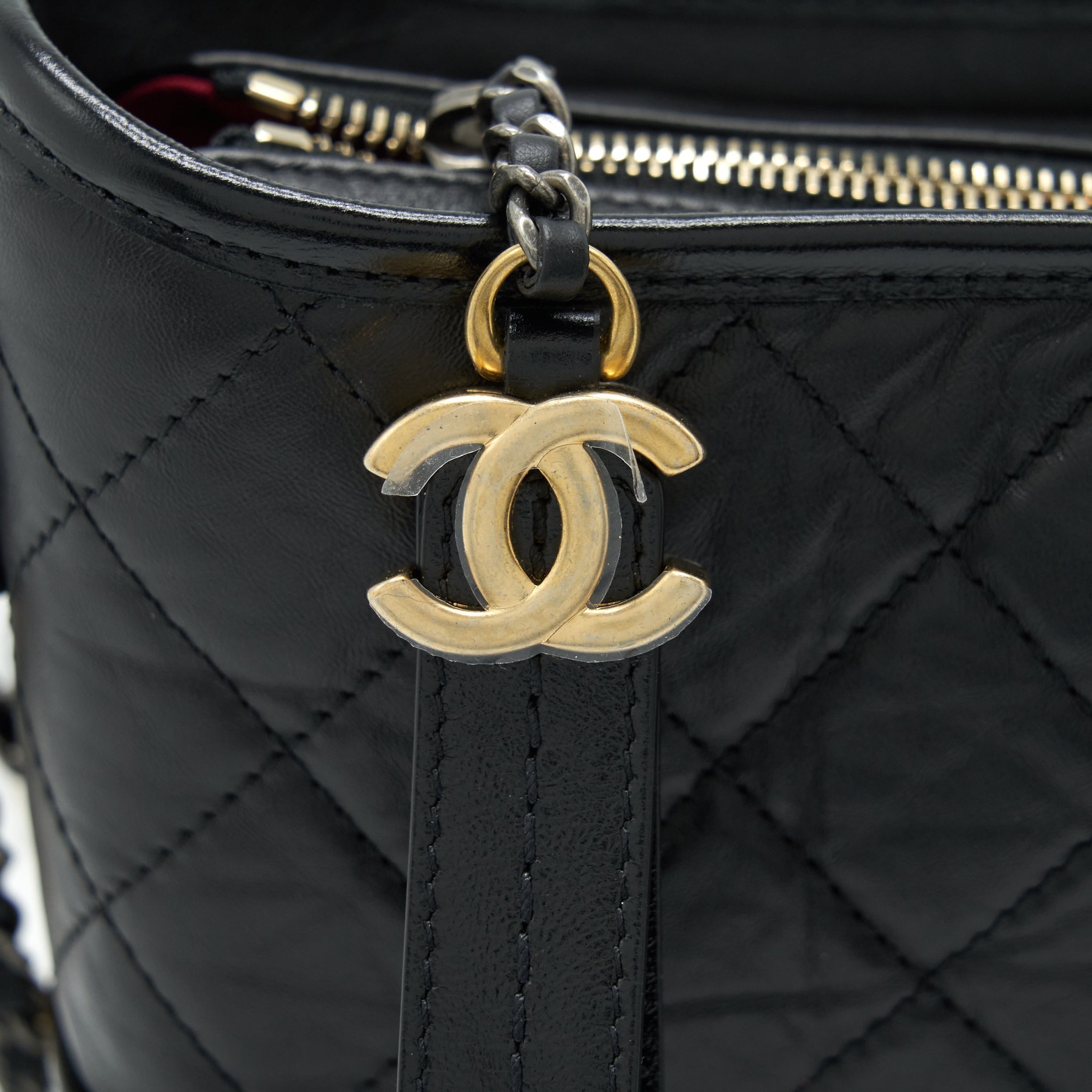 chanel-small-gabrielle-hobo-bag-calfskin-black-with-multicolour-hardware-microchip-1
