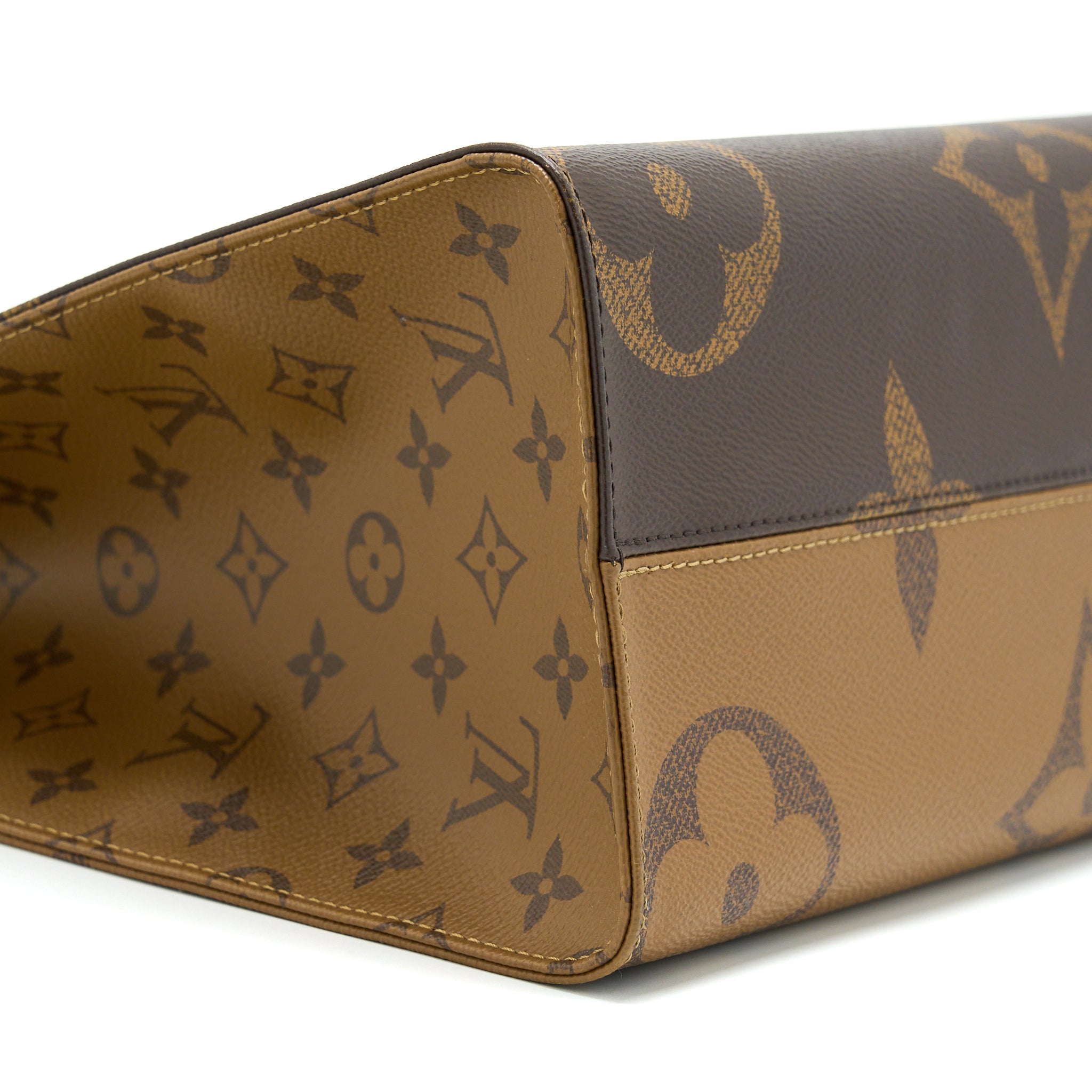louis-vuitton-on-the-go-mm-monogram-reverse-canvas-ghw